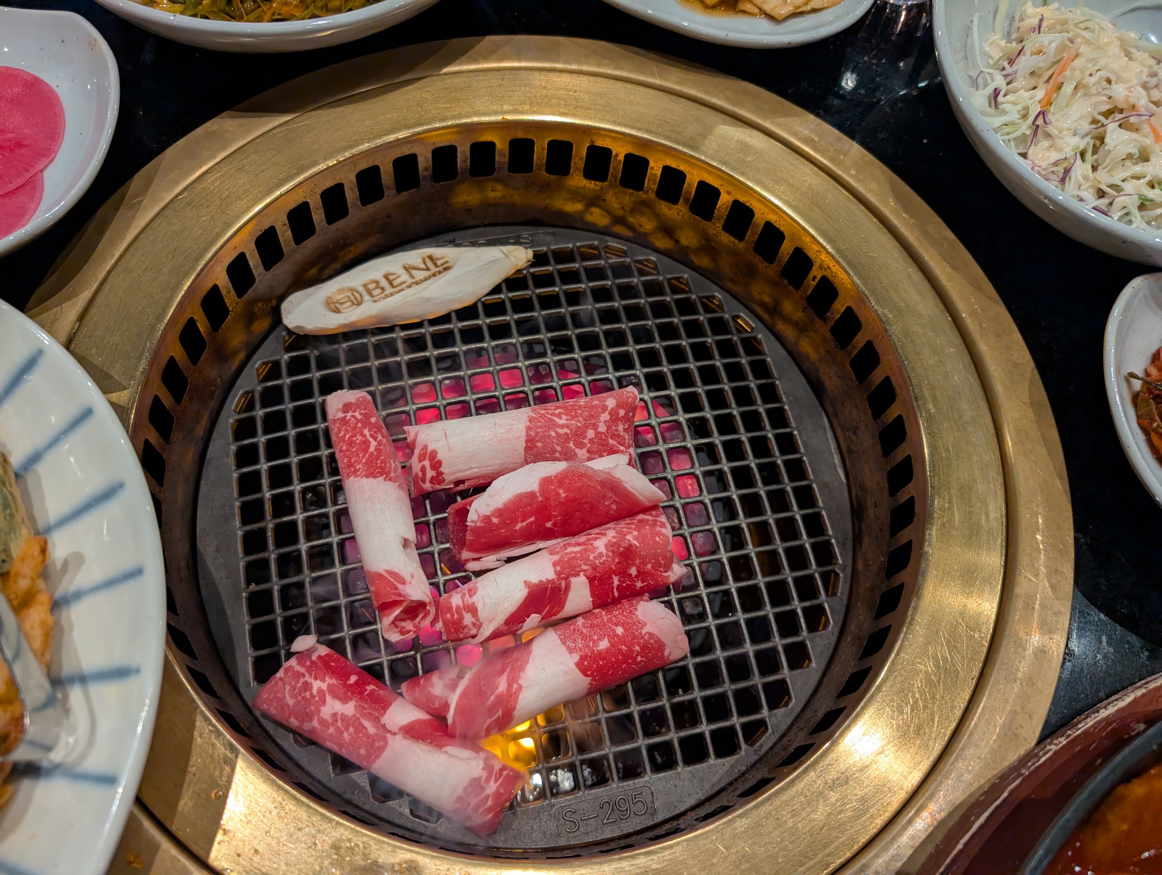 Beef on the grill at Bene Korean BBQ. (Su-Jit Lin for the AJC)