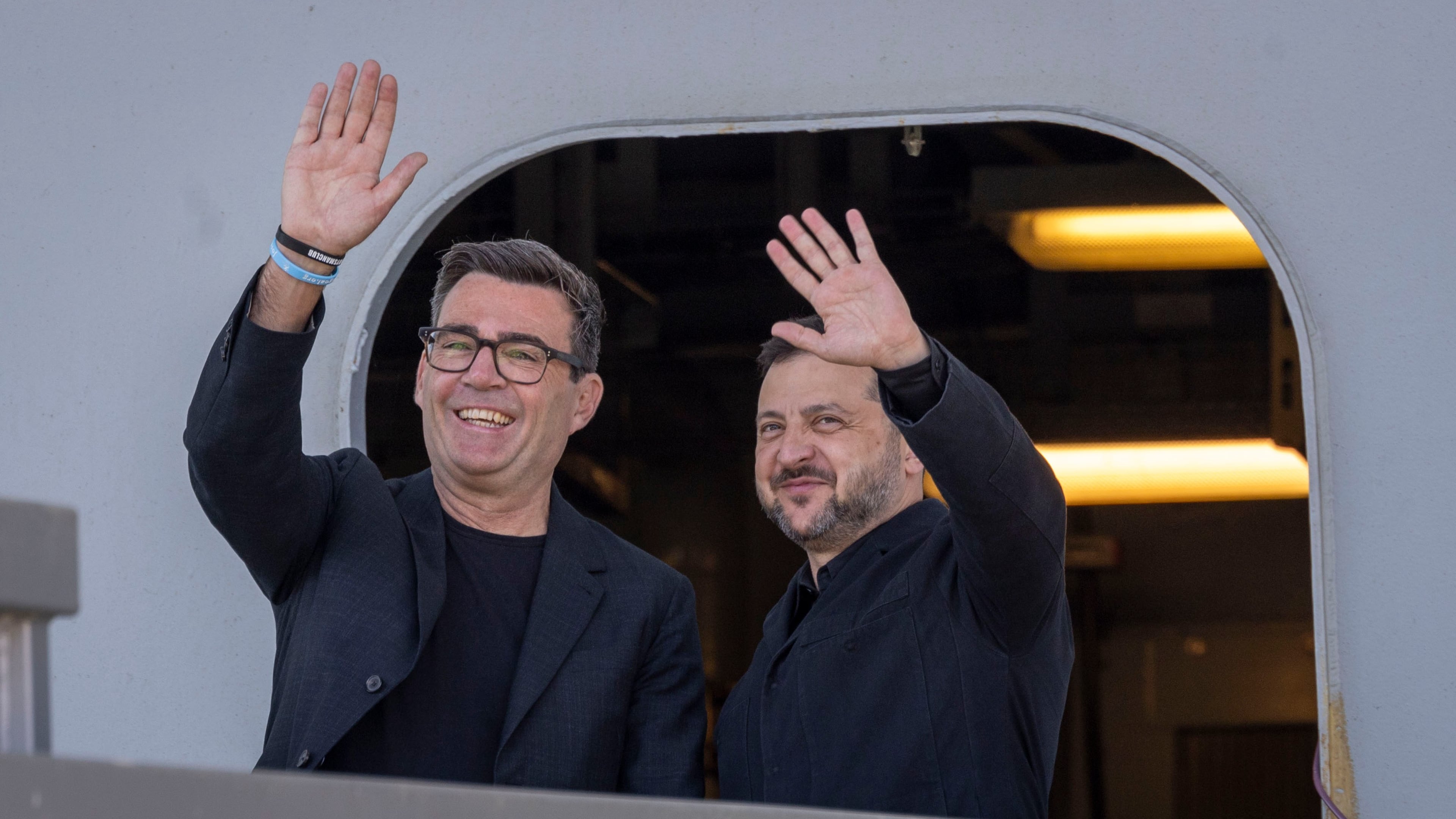 Britain's Prime Minister Andy Burnham, left, and Ukraine's President Volodymyr Zelenskyy visit HM Naval Base in Portsmouth, England, Monday July 27, 2026. (Simon Jones/Pool Photo via AP)