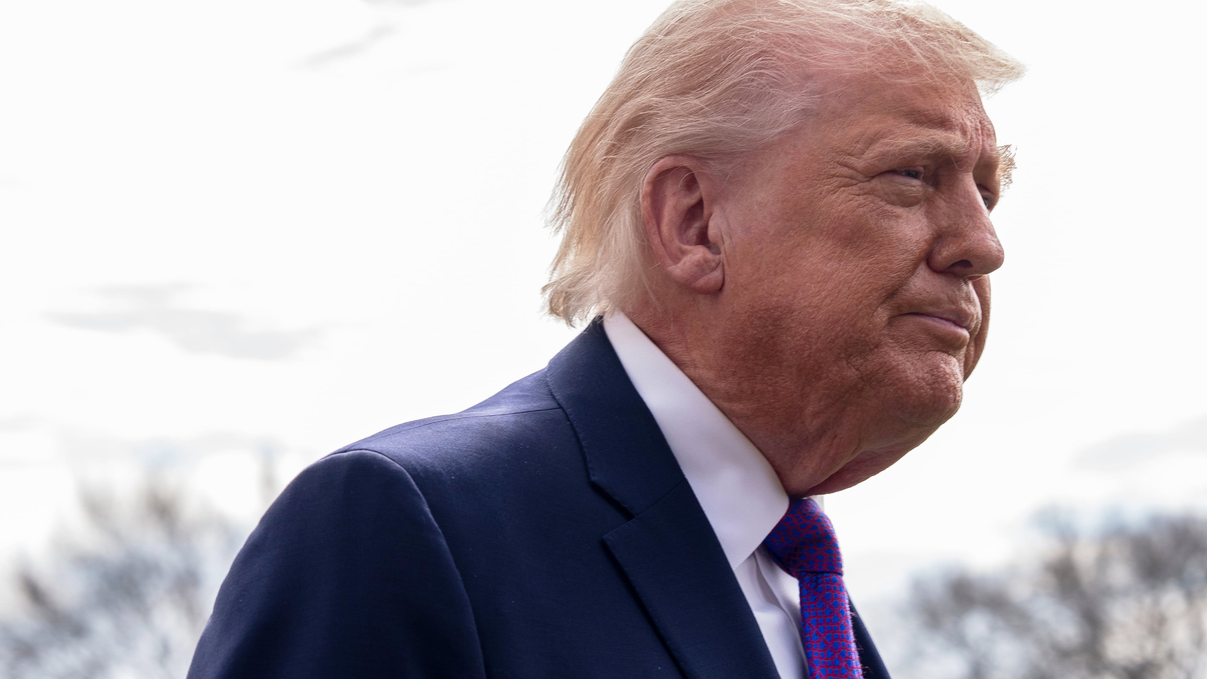President Donald Trump speaks with reporters before departing on Marine One from the South Lawn of the White House, Wednesday, March 11, 2026, in Washington. (AP Photo/Alex Brandon)