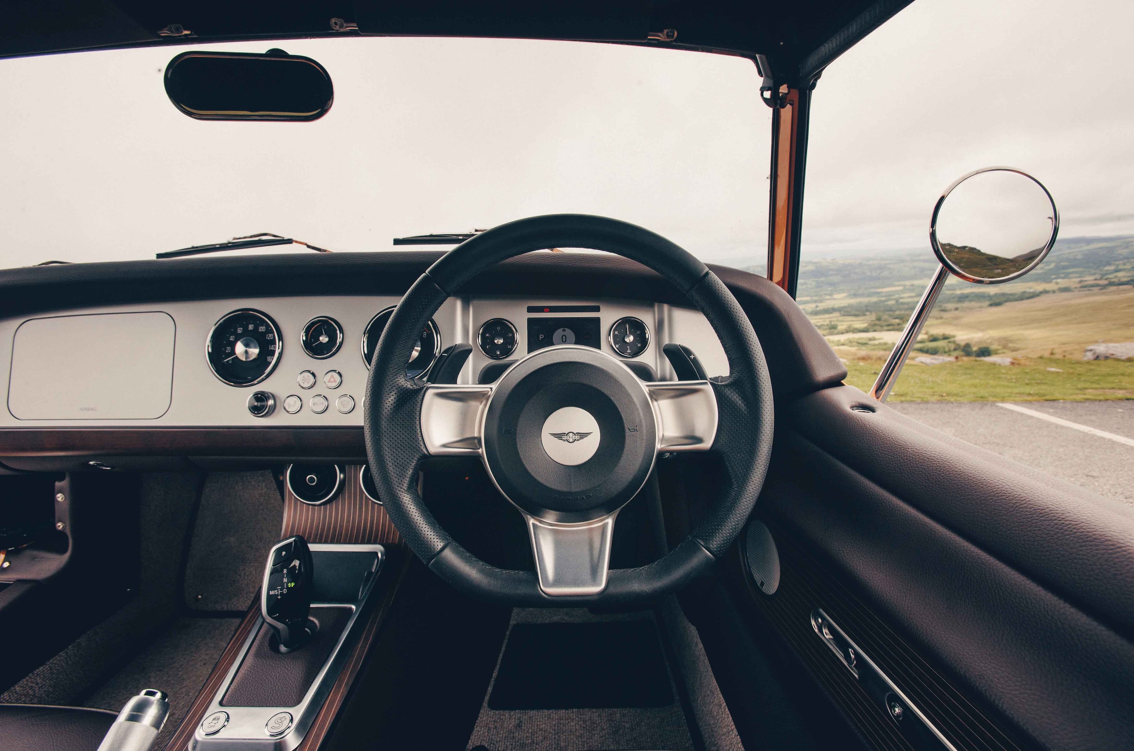 The limited production Morgan Supersport is a hand-built British sports car with a little digital gauge cluster but no central touchscreen. (Courtesy of Morgan)