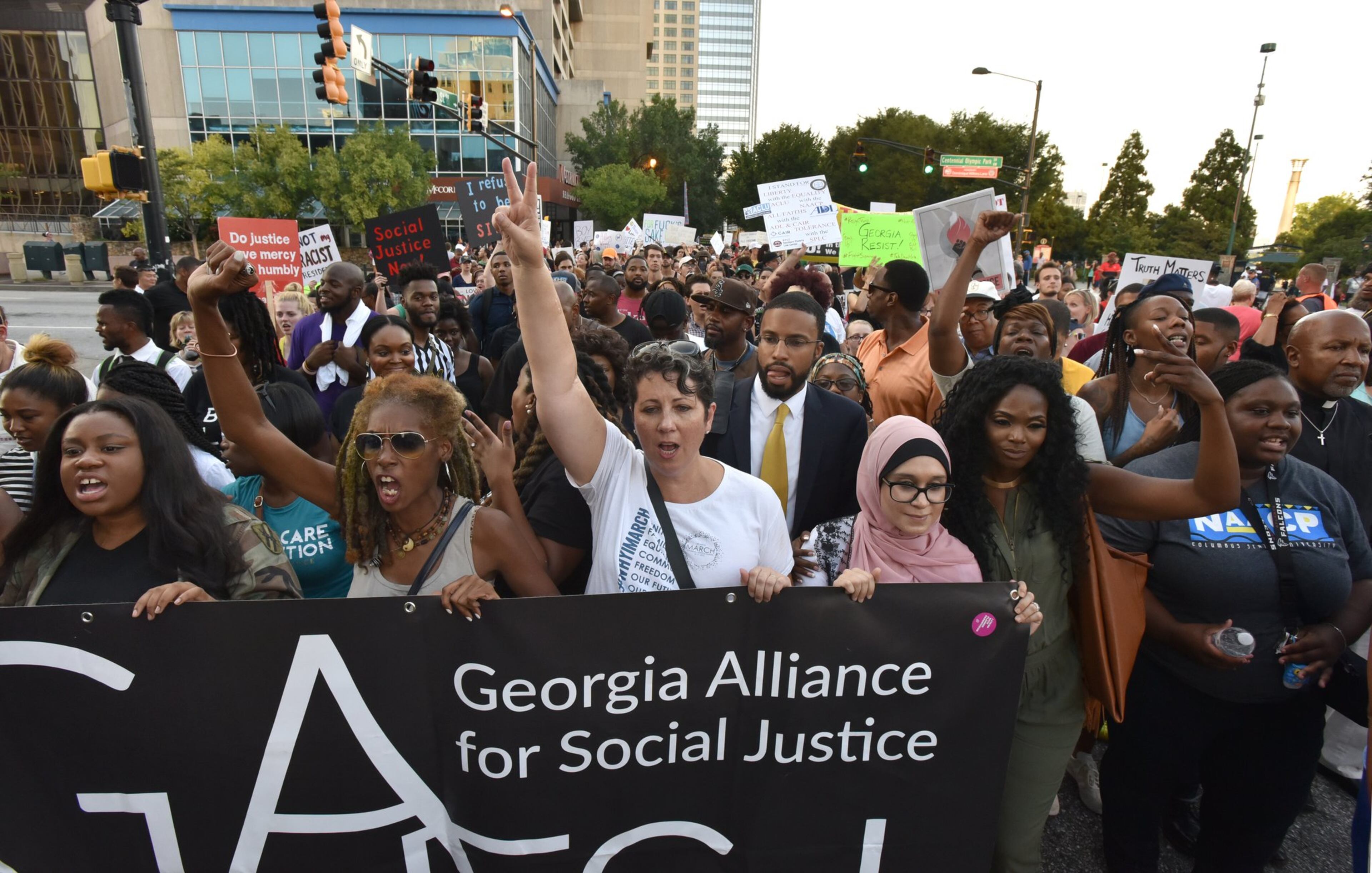 The Georgia Alliance for Social Justice organized the Take Down White Supremacy March on Aug. 19, 2017. HYOSUB SHIN / HSHIN@AJC.COM`