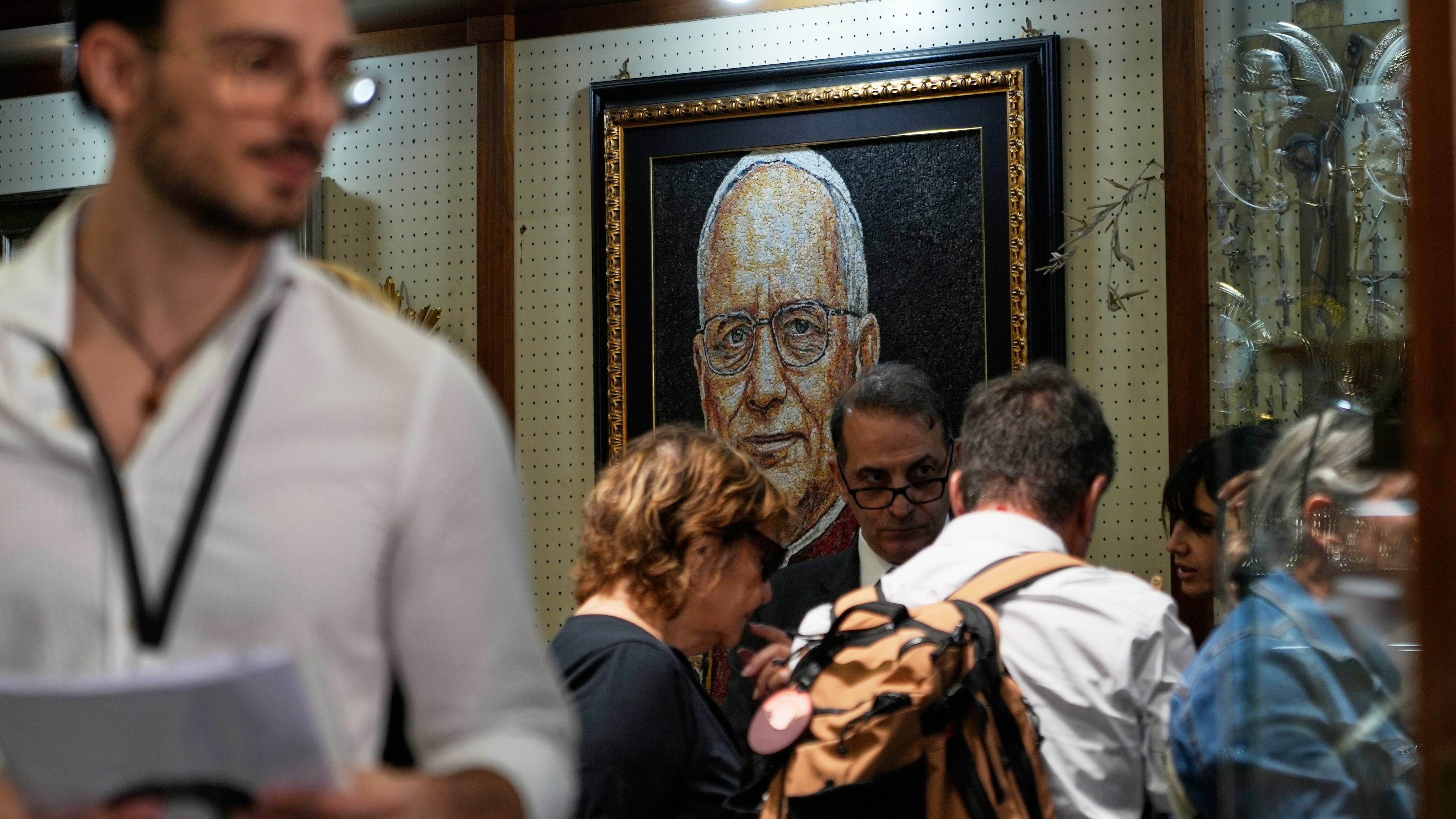 A mosaic of Pope Leo XIV is displayed inside a shop selling religious items near St. Peter's Square, in Rome, Monday, Oct. 12, 2026. (AP Photo/Gregorio Borgia)