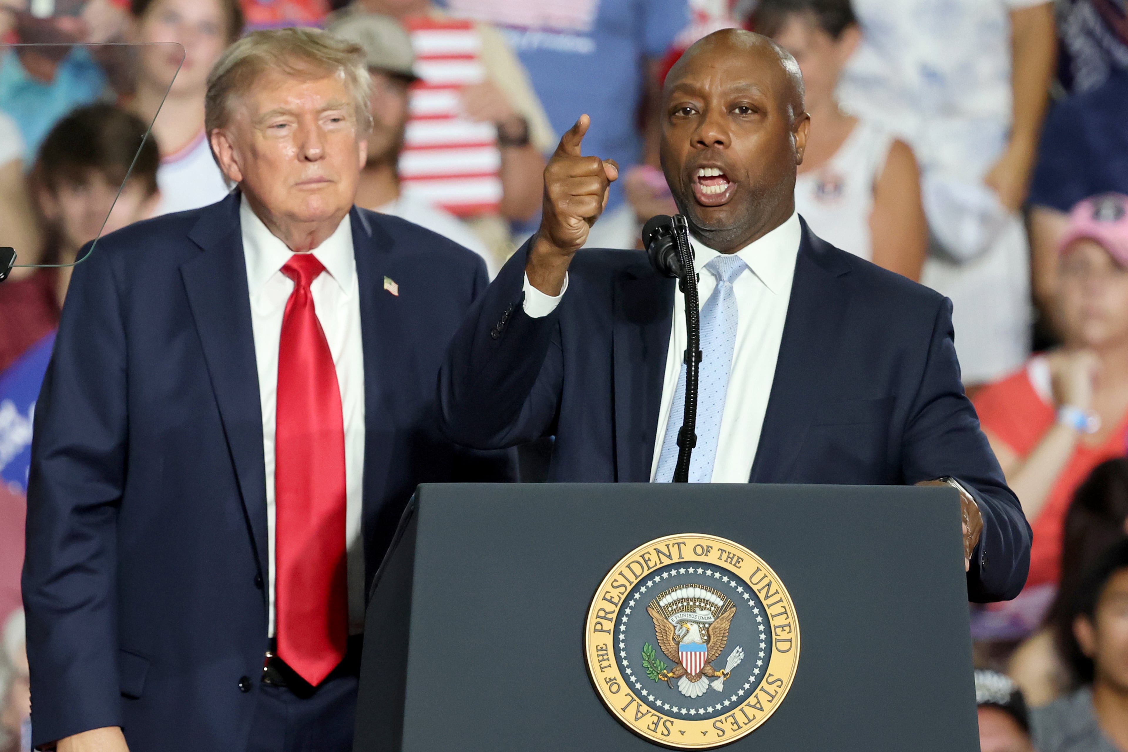 U.S. Sen. Tim Scott, seen here at a campaign event with President Donald Trump last month. (Mic Smith/AP)