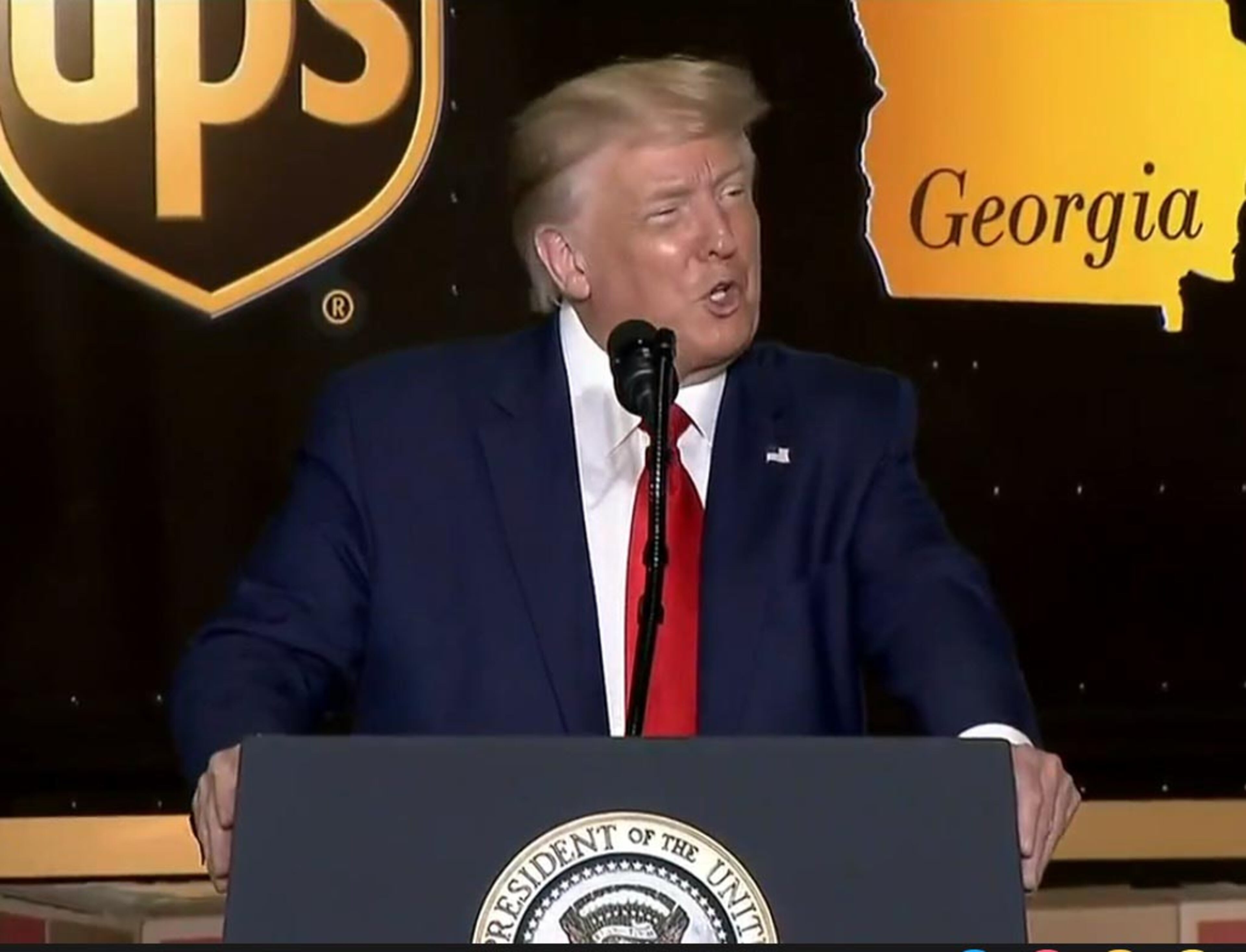 President Donald Trump speaks at a UPS hub Wednesday at the Atlanta airport.
