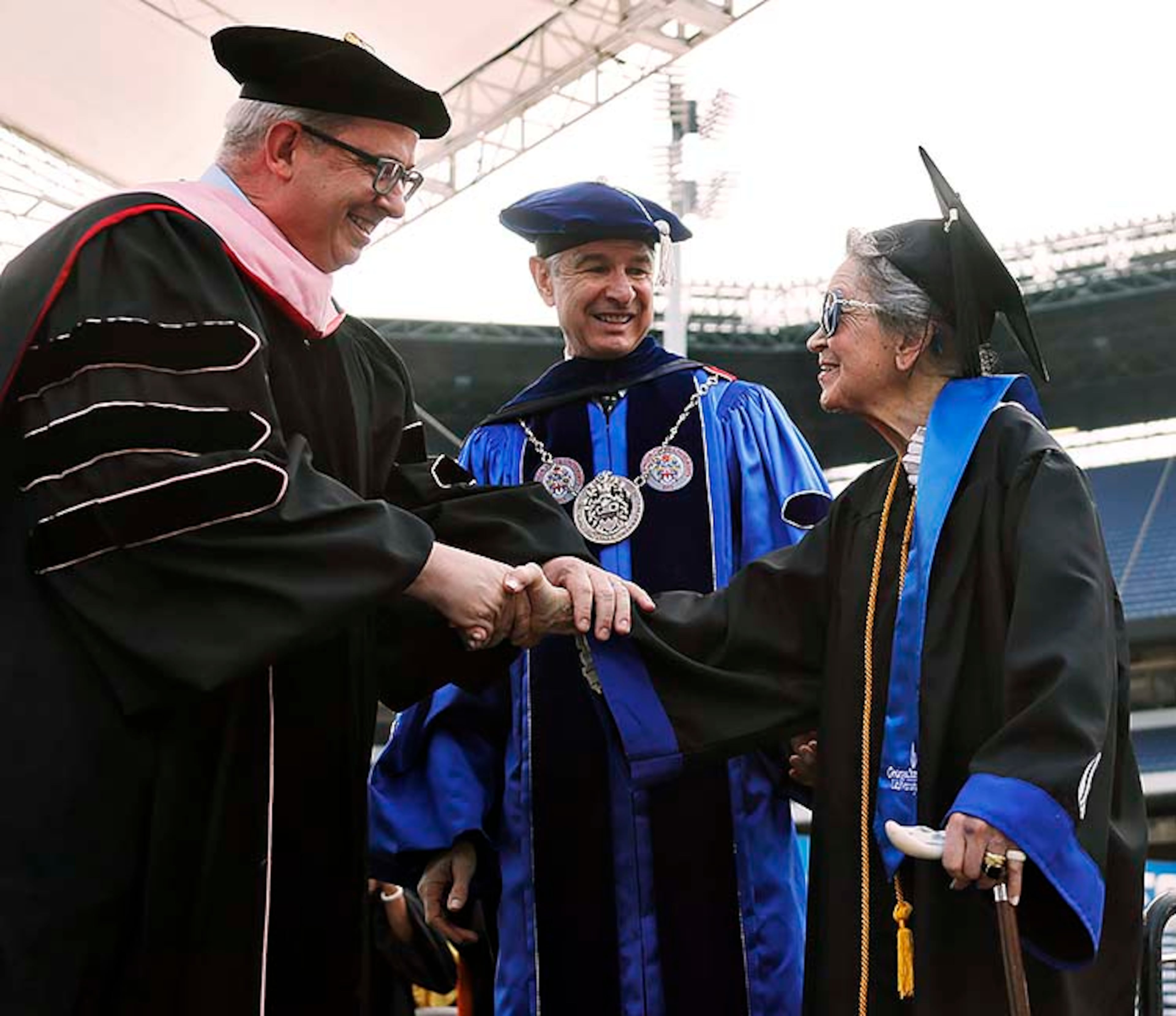 May 9, 2019 - Atlanta - Joyce Lowenstein, 93, is congratulated by Georgia State President Mark Becker (center) and College of the Arts Dean Wade Weast after she received her bachelor's degree Thursday from Georgia State University. She started taking classes there in 2012, Her degree is in art history. Bob Andres / bandres@ajc.com