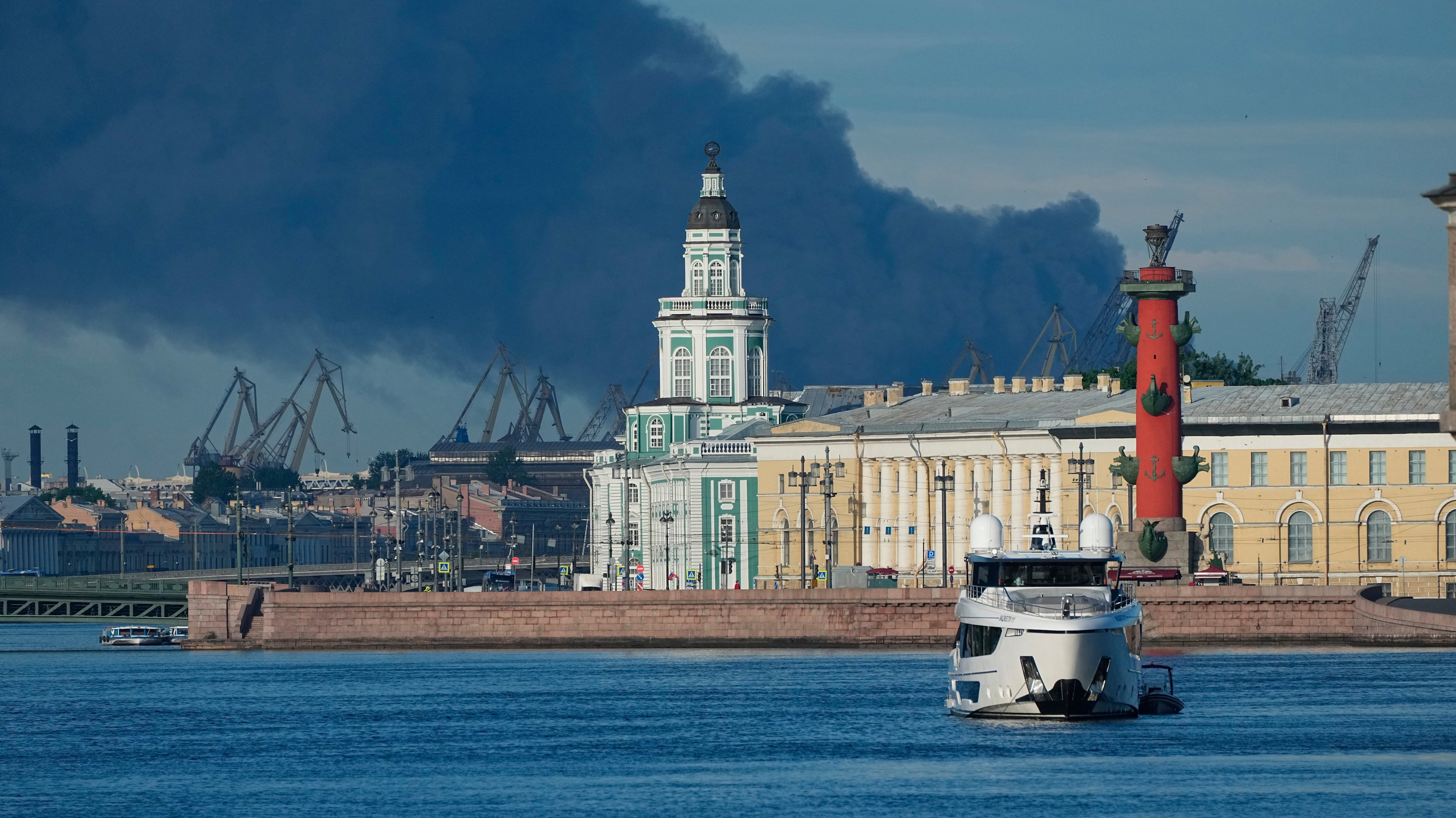 FILE - A plume of black smoke rises over the port of St. Petersburg, Russia, on June 3, 2026, after a Ukrainian drone attack. (AP Photo, File)