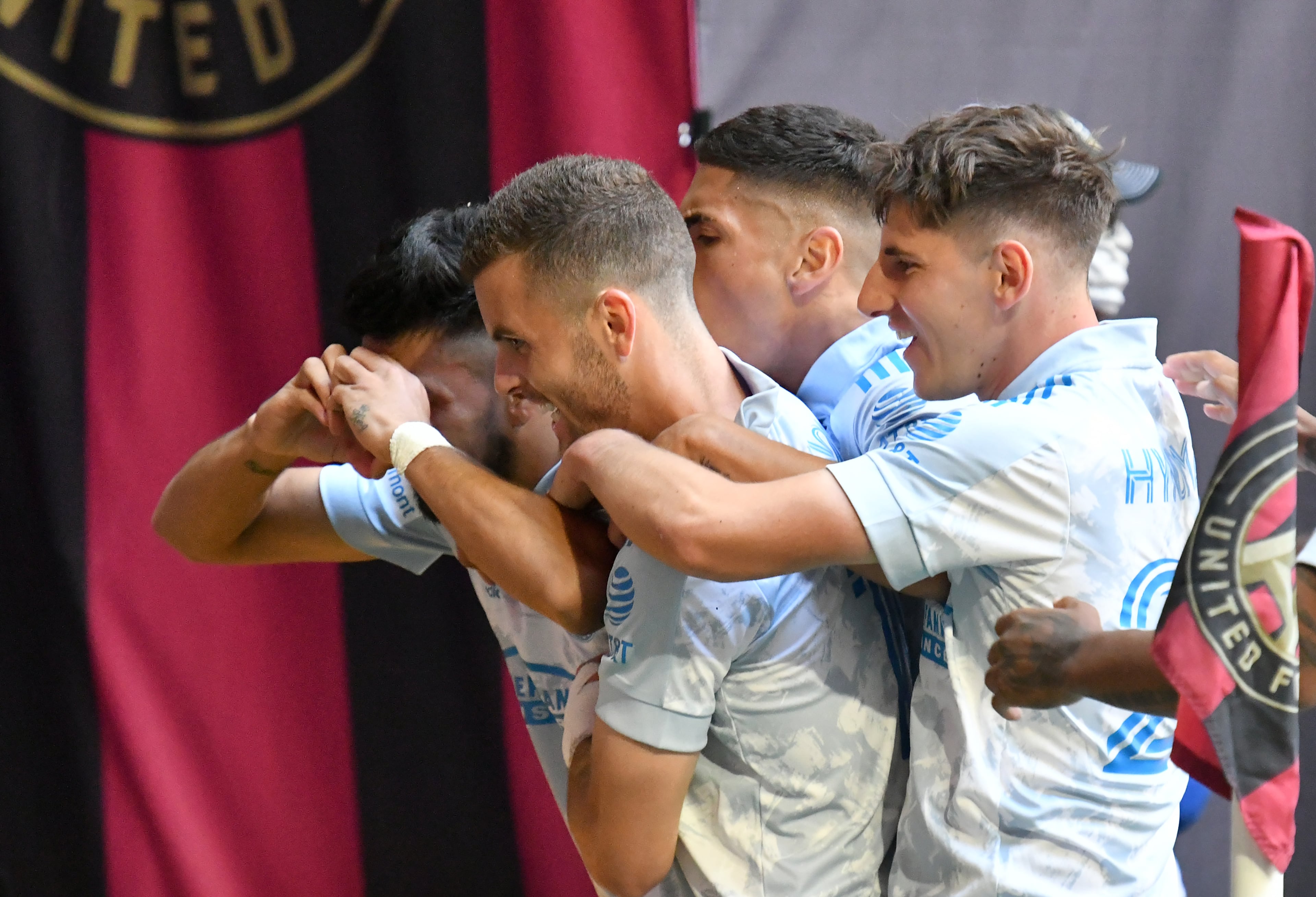 Atlanta United midfielder Marcelino Moreno (left) celebrates with teammates after scoring during the first half in a MLS soccer match at Mercedes-Benz Stadium in Atlanta on Saturday, May 29, 2021. (Hyosub Shin / Hyosub.Shin@ajc.com)