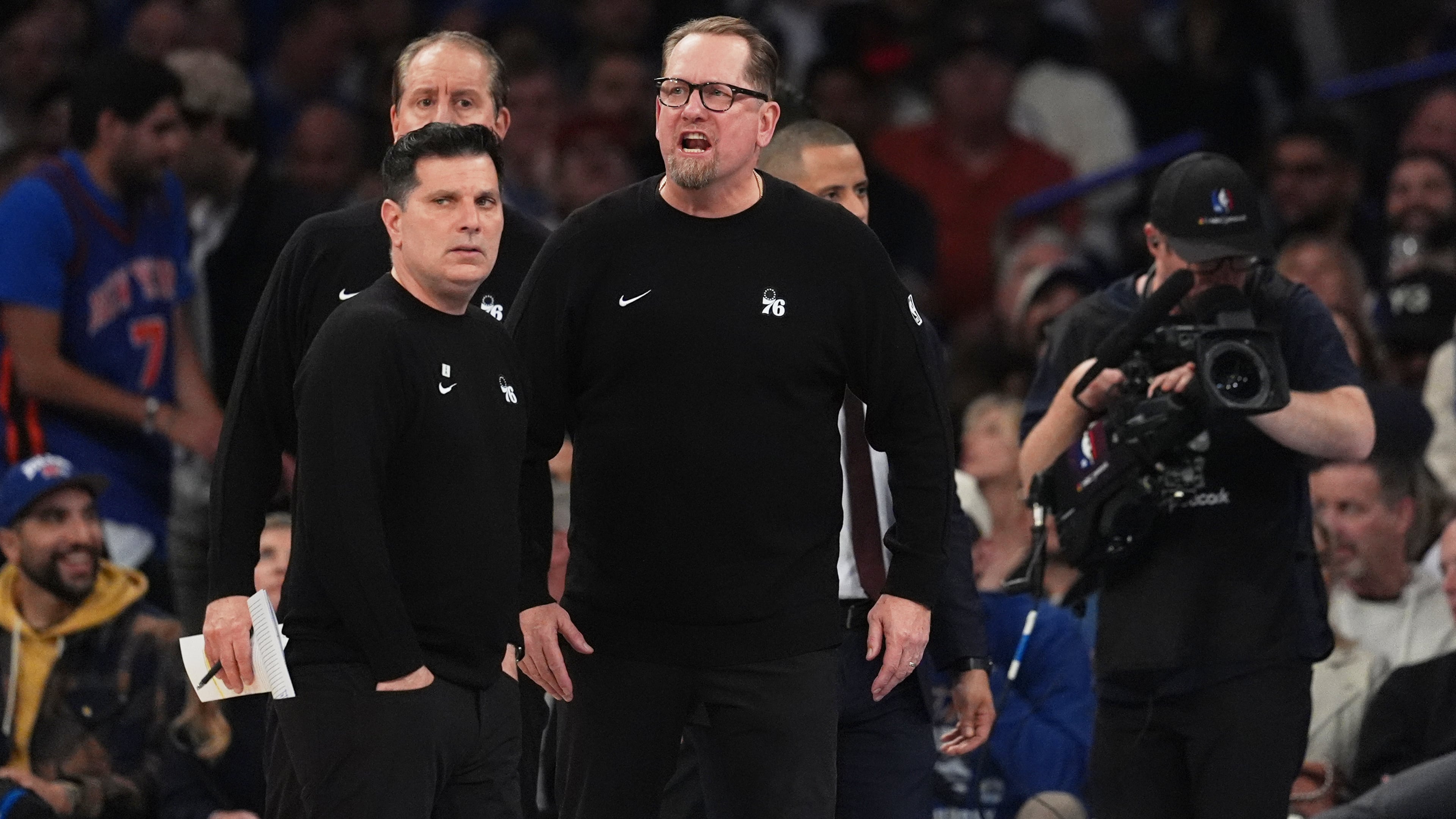 Philadelphia 76ers' Nick Nurse, center, yells during a time out during the second half of Game 1 in a second-round NBA basketball playoffs series against the New York Knicks Monday, May 4, 2026, in New York. (AP Photo/Seth Wenig)