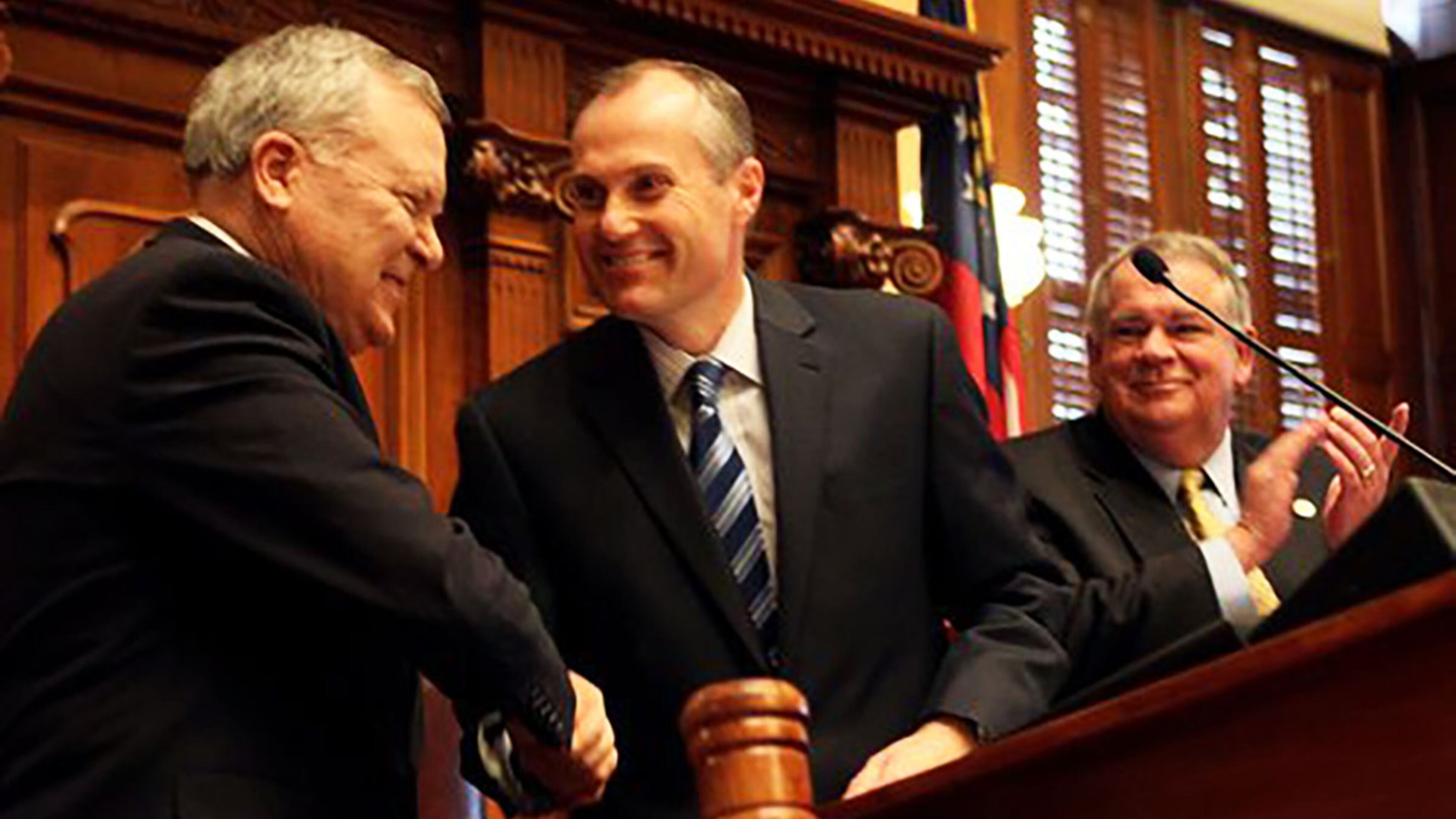 Gov. Nathan Deal (from left) is welcomed to the podium by Lt. Gov. Casey Cagle and House Speaker David Ralston. Staff / 2011 photo