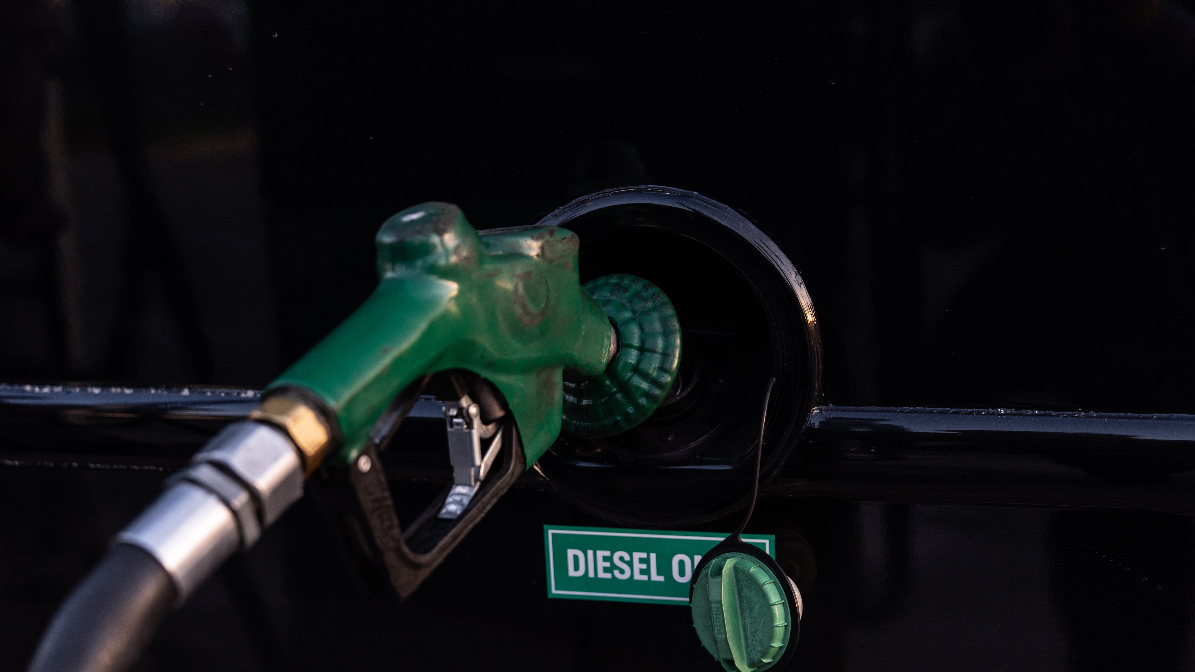 FILE - A nozzle pumps diesel into the fuel tank of bus in Orange, Calif., Tuesday, April 7, 2026. (AP Photo/Jae C. Hong, File)