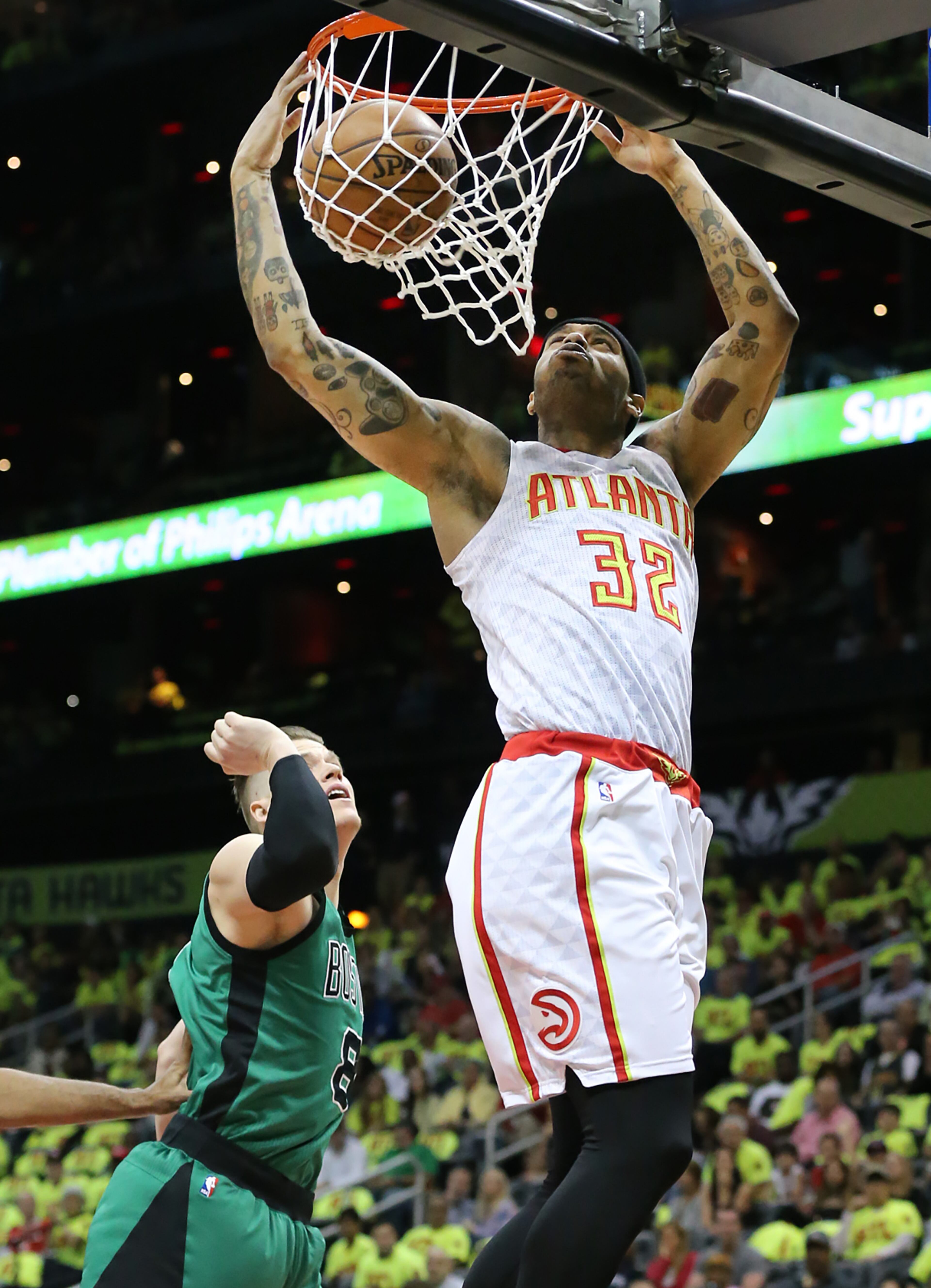 041616 ATLANTA: Hawks Mike Scott slams for two over Celtics Jonas Jerebko in their NBA Eastern Conference first round playoff game at Philips Arena on Saturday, April 16, 2016. Curtis Compton / ccompton@ajc.com