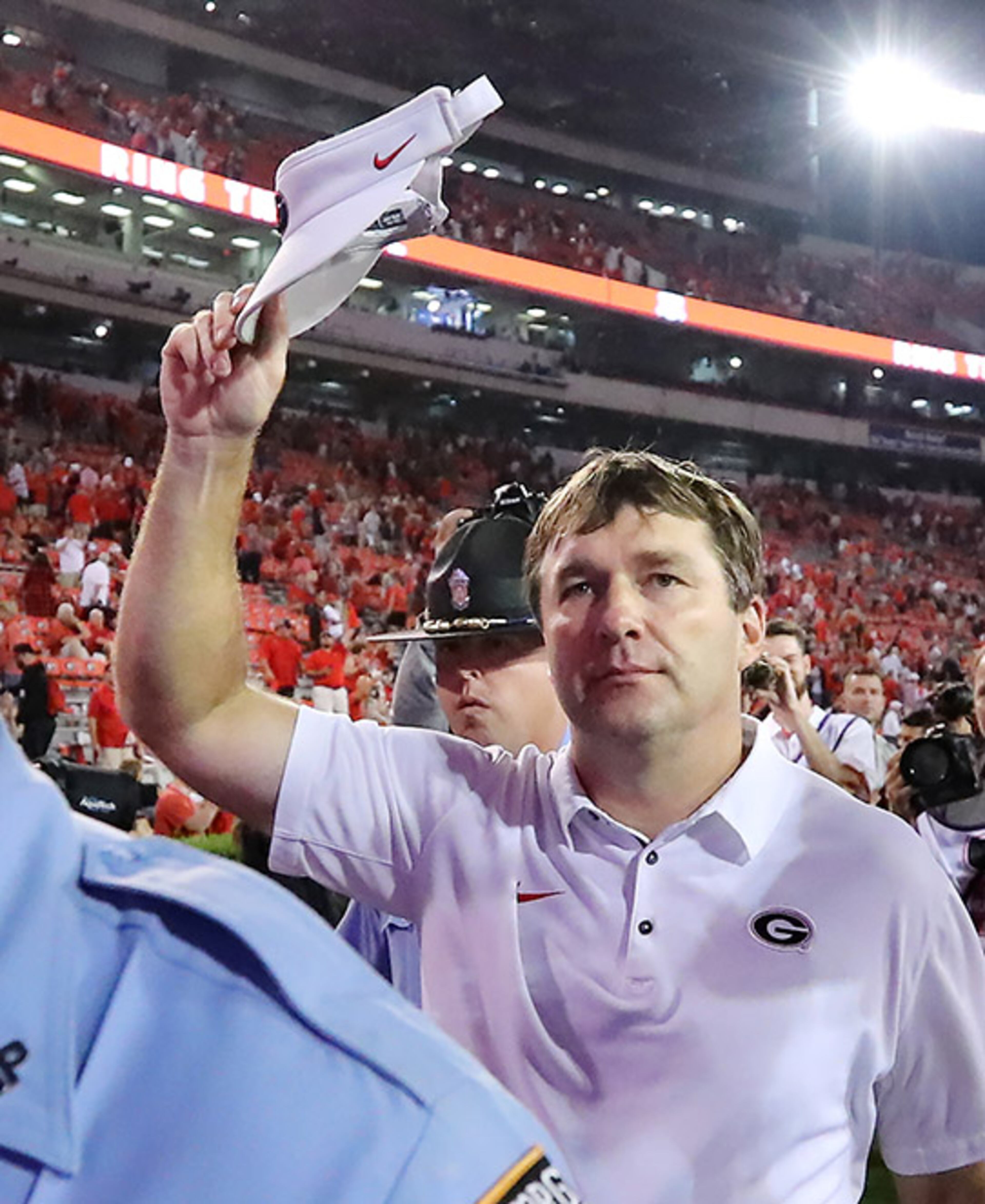 Georgia head coach Kirby Smart tips his cap to fans after beating Missouri 53-28 Saturday, Oct. 14, 2017, in Athens.