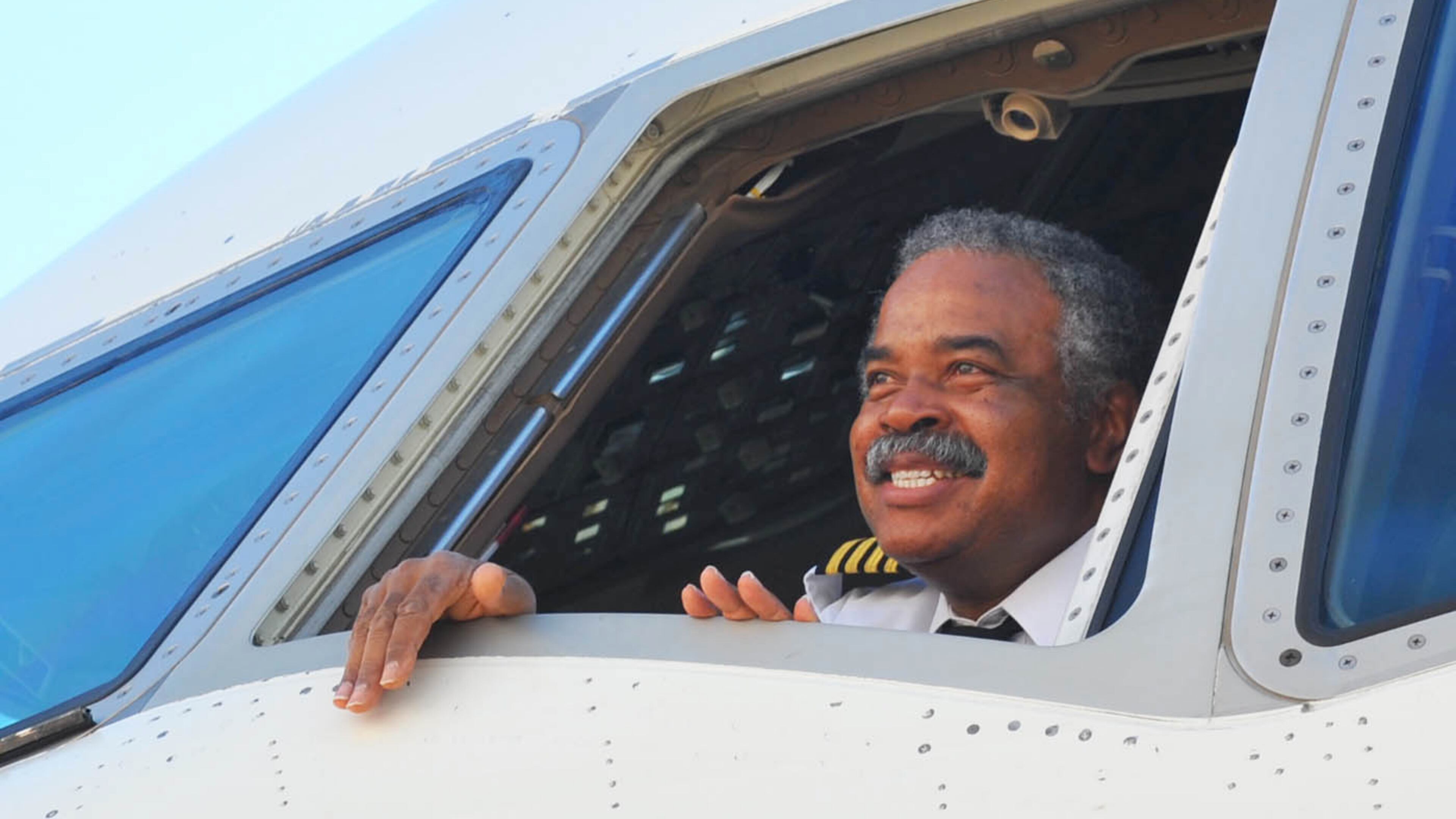 Capt. Calvin Flanigan looks out after his final flight as a Delta pilot on March 8, 2013.