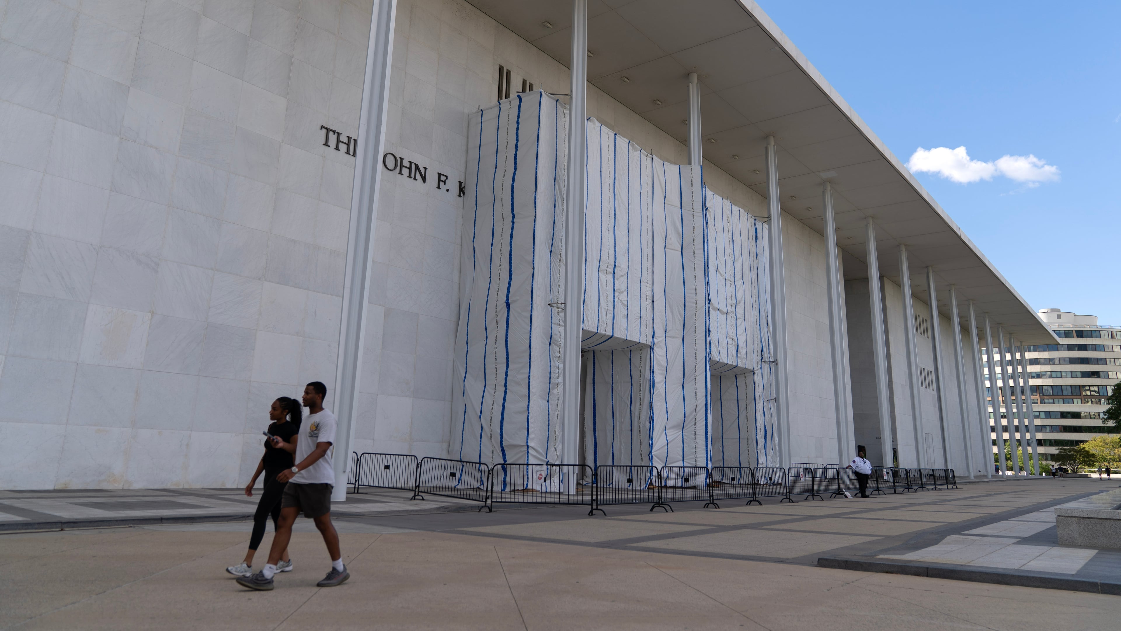 Visitors walk at The John F. Kennedy Center for the Performing Arts, Sunday, Sept. 6, 2026, in Washington. (AP Photo/Jose Luis Magana)