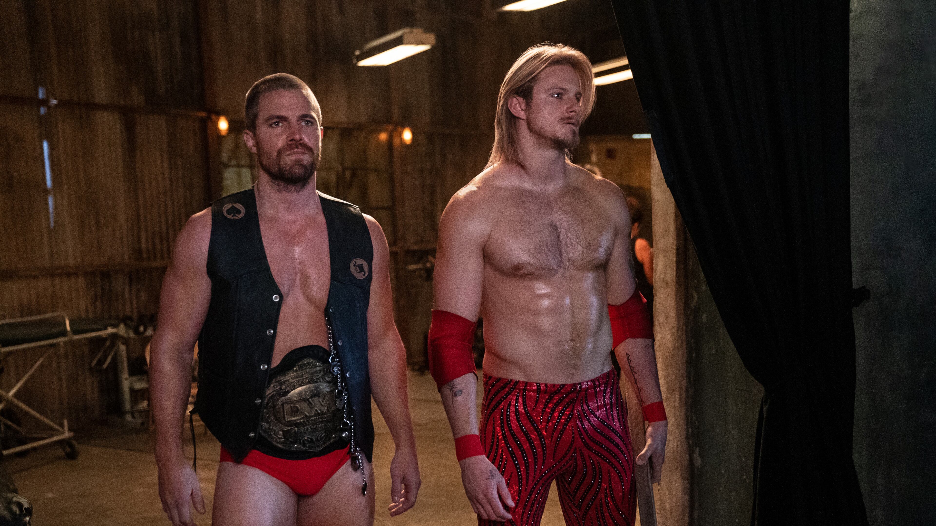 Stephen Amell and Alexander Ludwig plays brothers who run a local Georgia wrestling league in Starz's "Heels." STARZ
