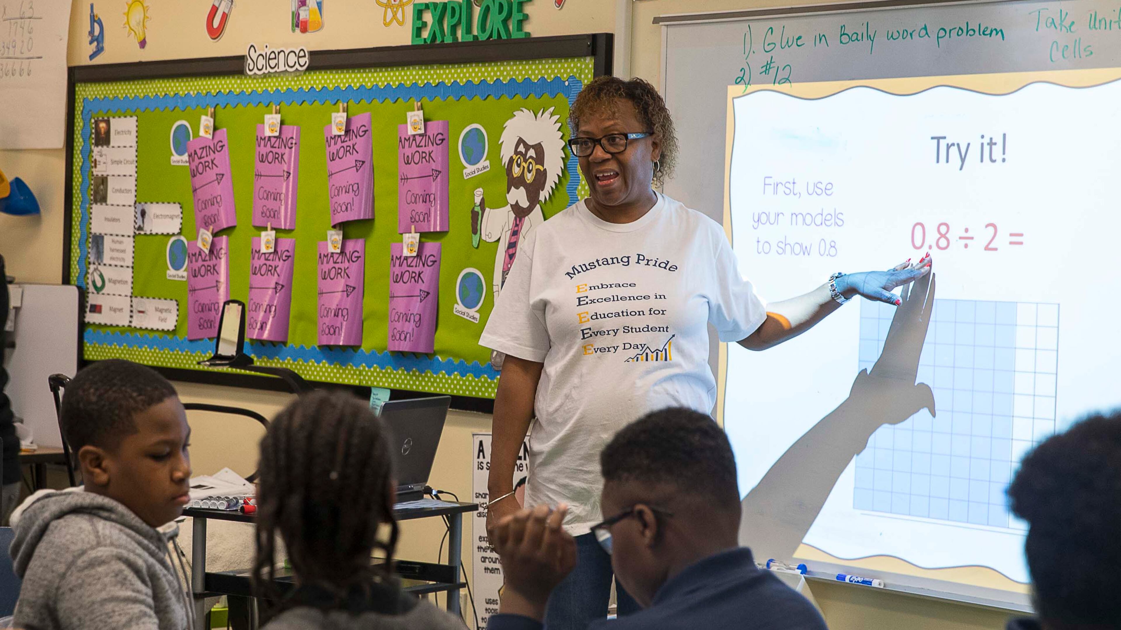 Fifth-grade teacher Chandra Lewis conducts a math lesson for her students at Cliftondale Elementary School in College Park. (Alyssa Pointer/Atlanta Journal Constitution)