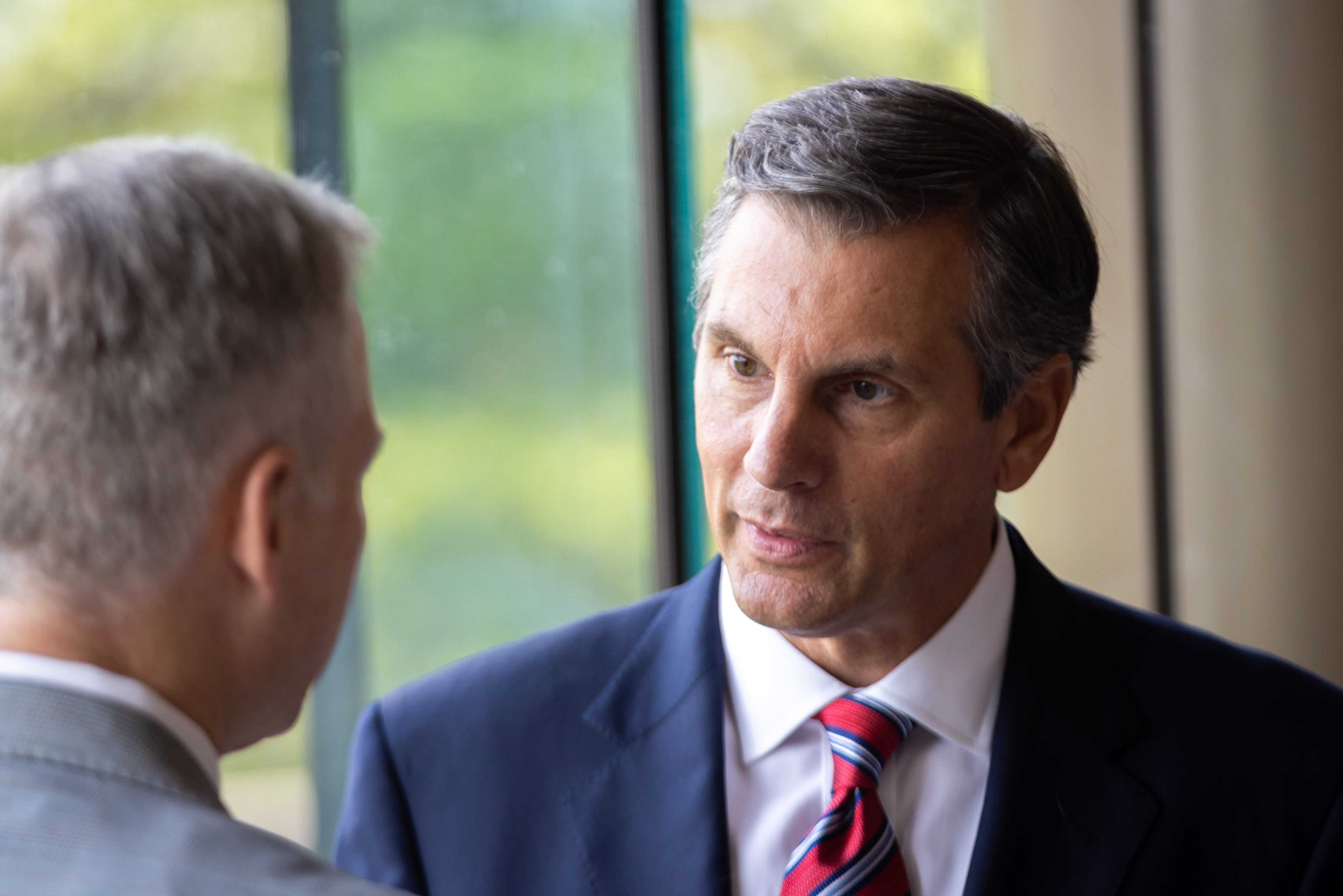 Former football coach Derek Dooley (right) is a candidate for the U.S. Senate. (Arvin Temkar/AJC)