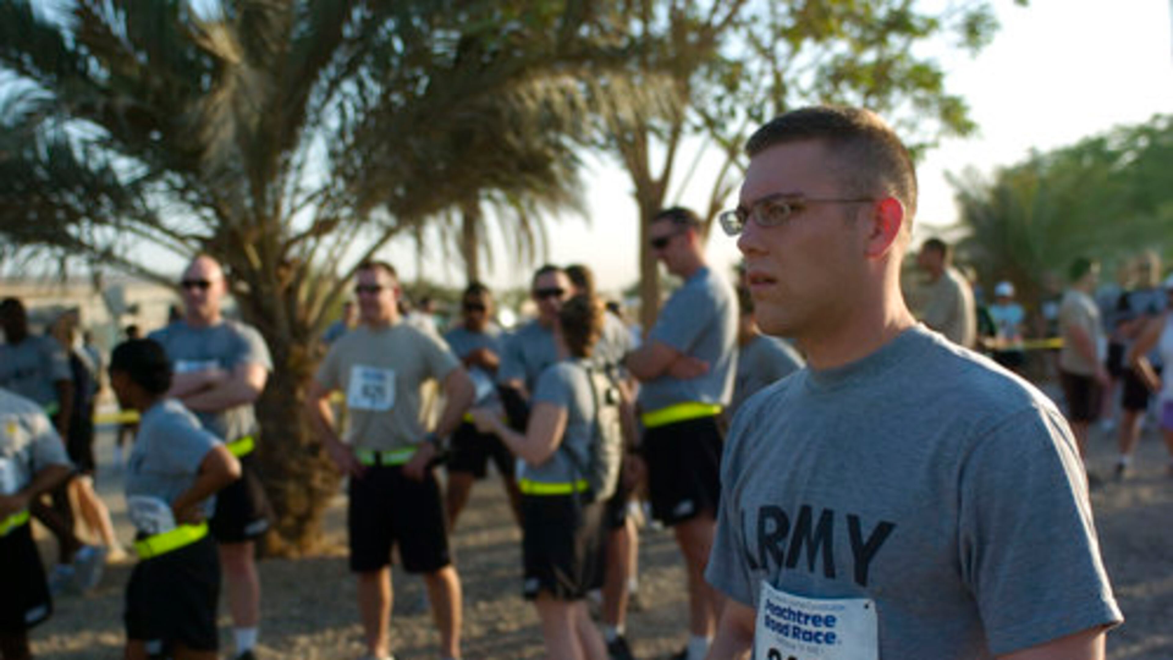 Running a "shadow" version of The Atlanta Journal-Constitution Peachtree Road Race outside of Atlanta has long been a part of the event. In 2008, these U.S. Army service members prepare to run a "shadow" version of the race at Camp Victory in Baghdad, Iraq. (Courtesy of Staff Sgt. Michel Sauret/U.S. Army)