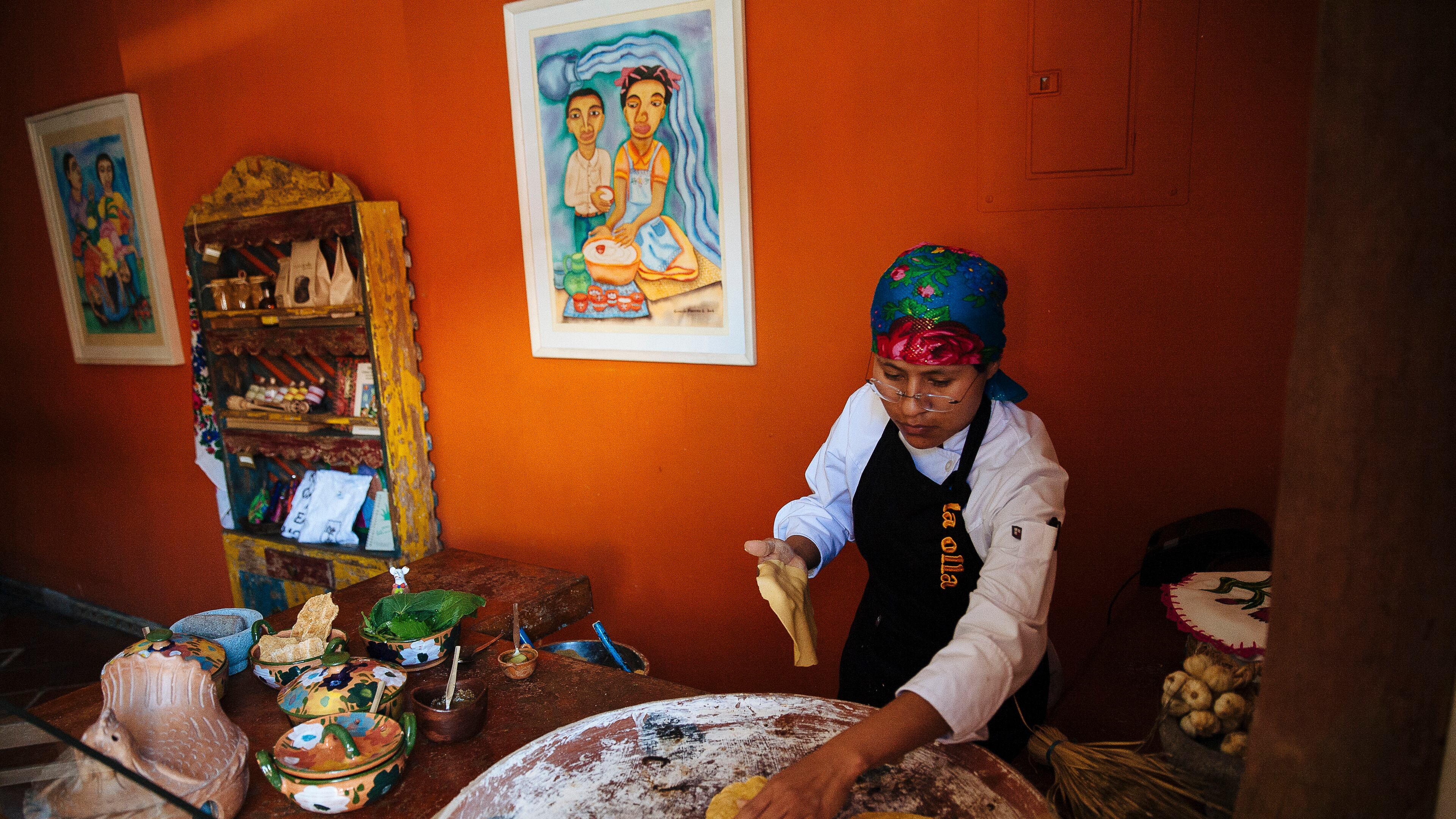 Maria Juana prepares corn tortillas at a restaurant in Oaxaca, Mexico, Feb. 7, 2016. An overseas taste for high-quality Mexican food and its earthy centerpiece, the handmade tortilla, has created a small but growing market for native corn.