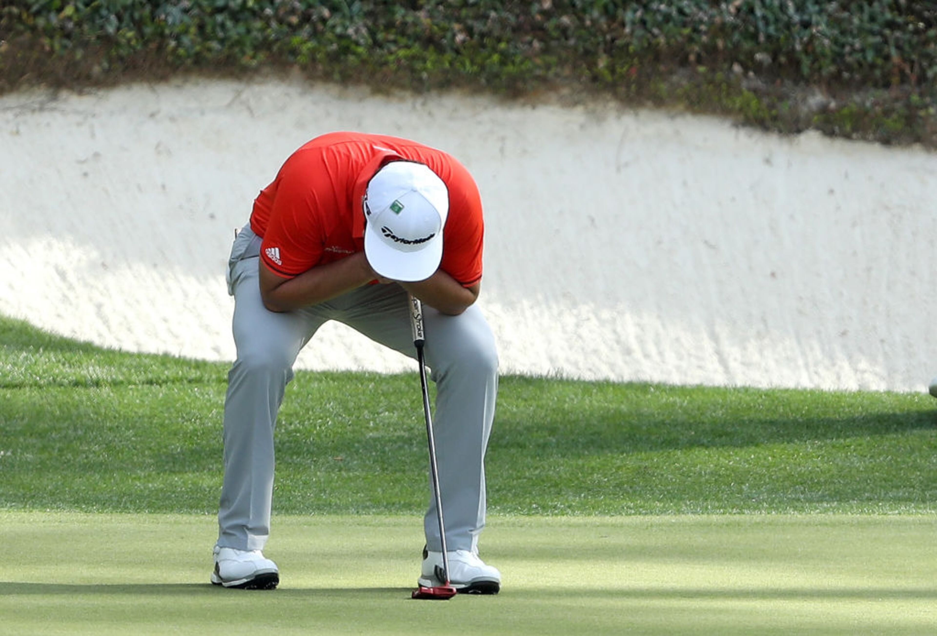 AUGUSTA, GA - APRIL 08: Jon Rahm of Spain reacts during the final round of the 2018 Masters Tournament at Augusta National Golf Club on April 8, 2018 in Augusta, Georgia. (Photo by David Cannon/Getty Images)