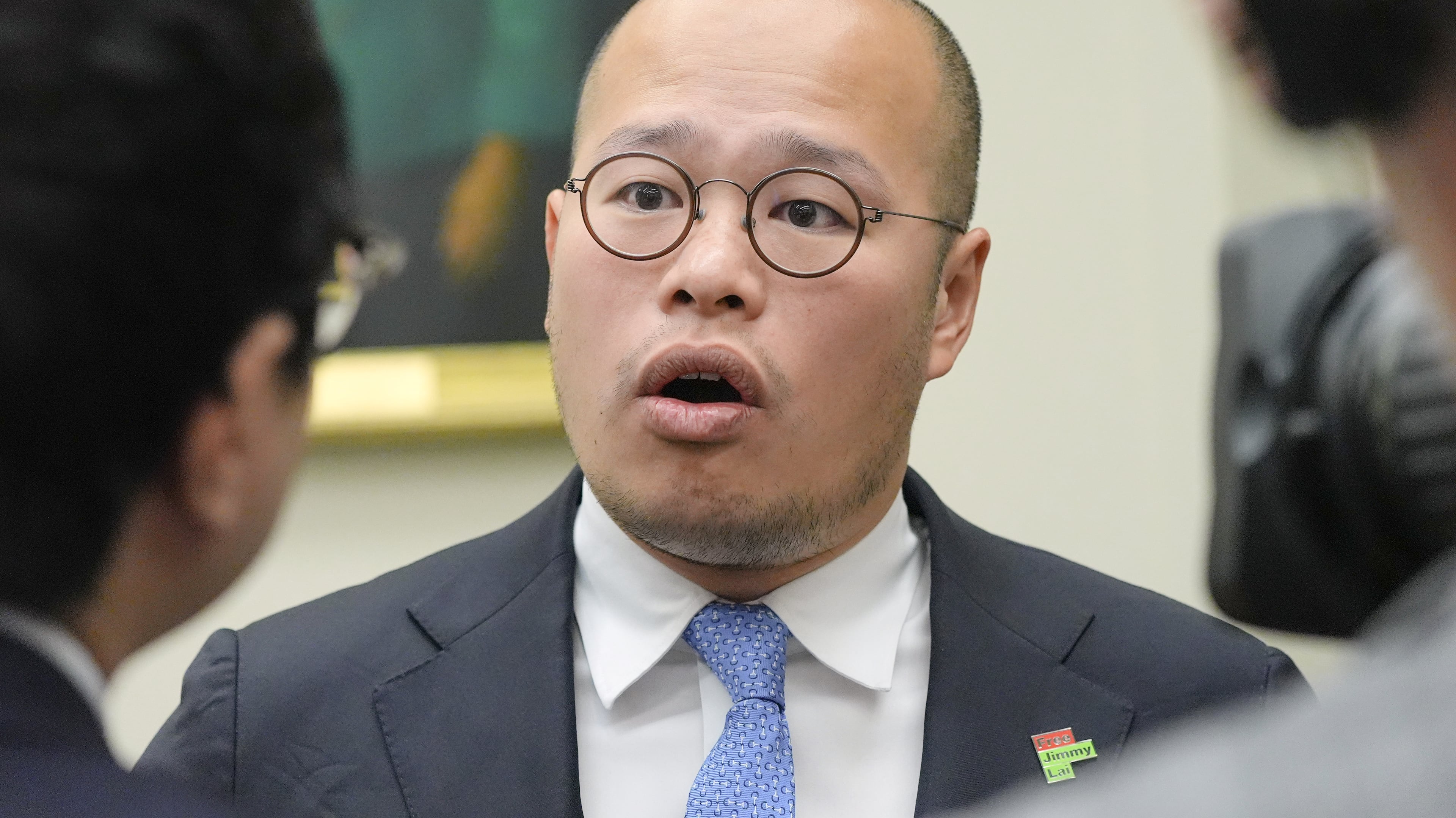 Sebastien Lai speaks with reporters after a Congressional Executive Commission on China regarding the continued imprisonment of his father Jimmy Lai on Capitol Hill, Wednesday, Sept. 16, 2026, in Washington. (AP Photo/Mariam Zuhaib)