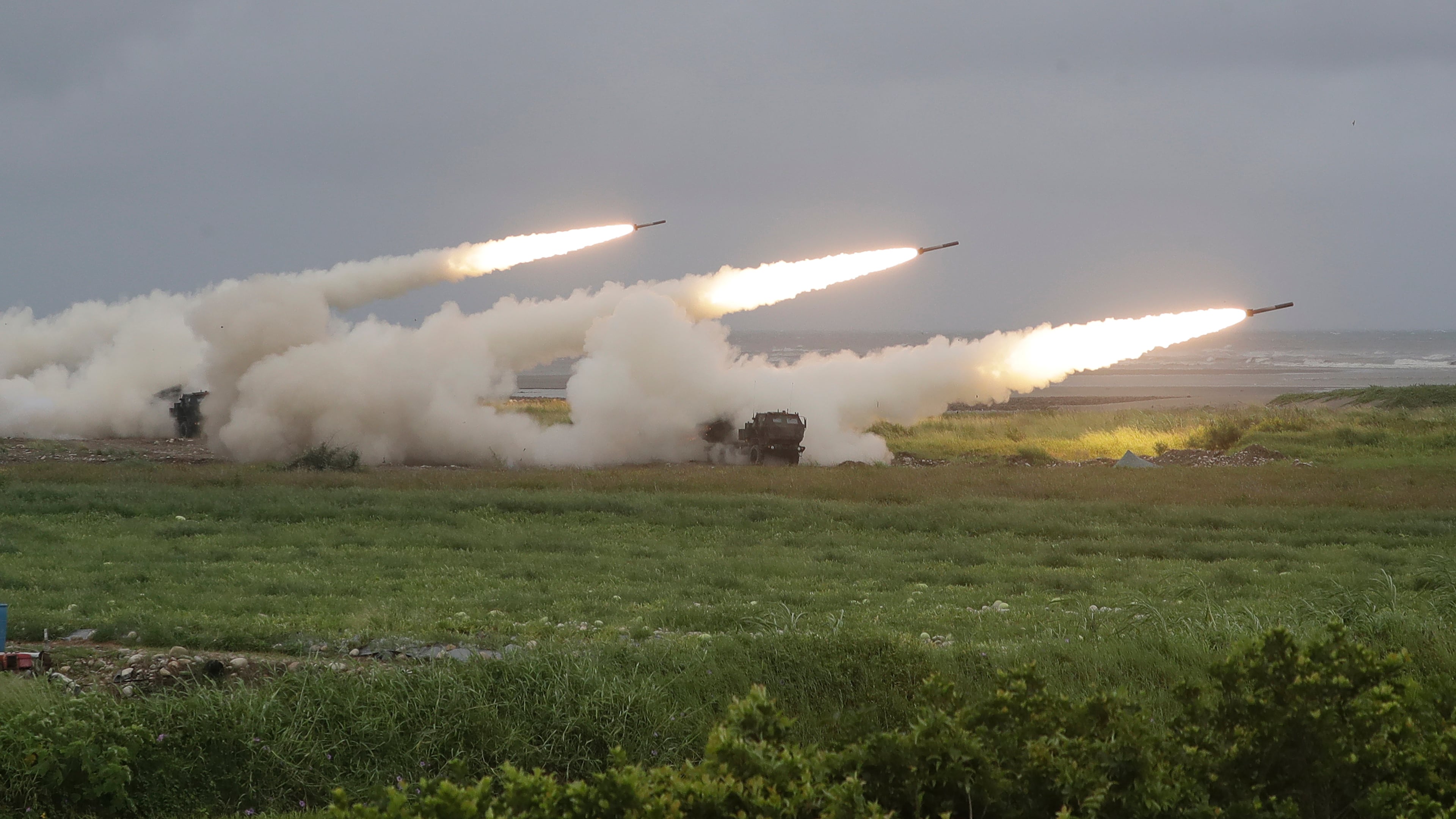 Rockets are launched from High Mobility Artillery Rocket System (HIMARS) during a military live-fire shooting training in Taichung City, Taiwan, Wednesday, June 10, 2026. (AP Photo/Chiang Ying-ying)