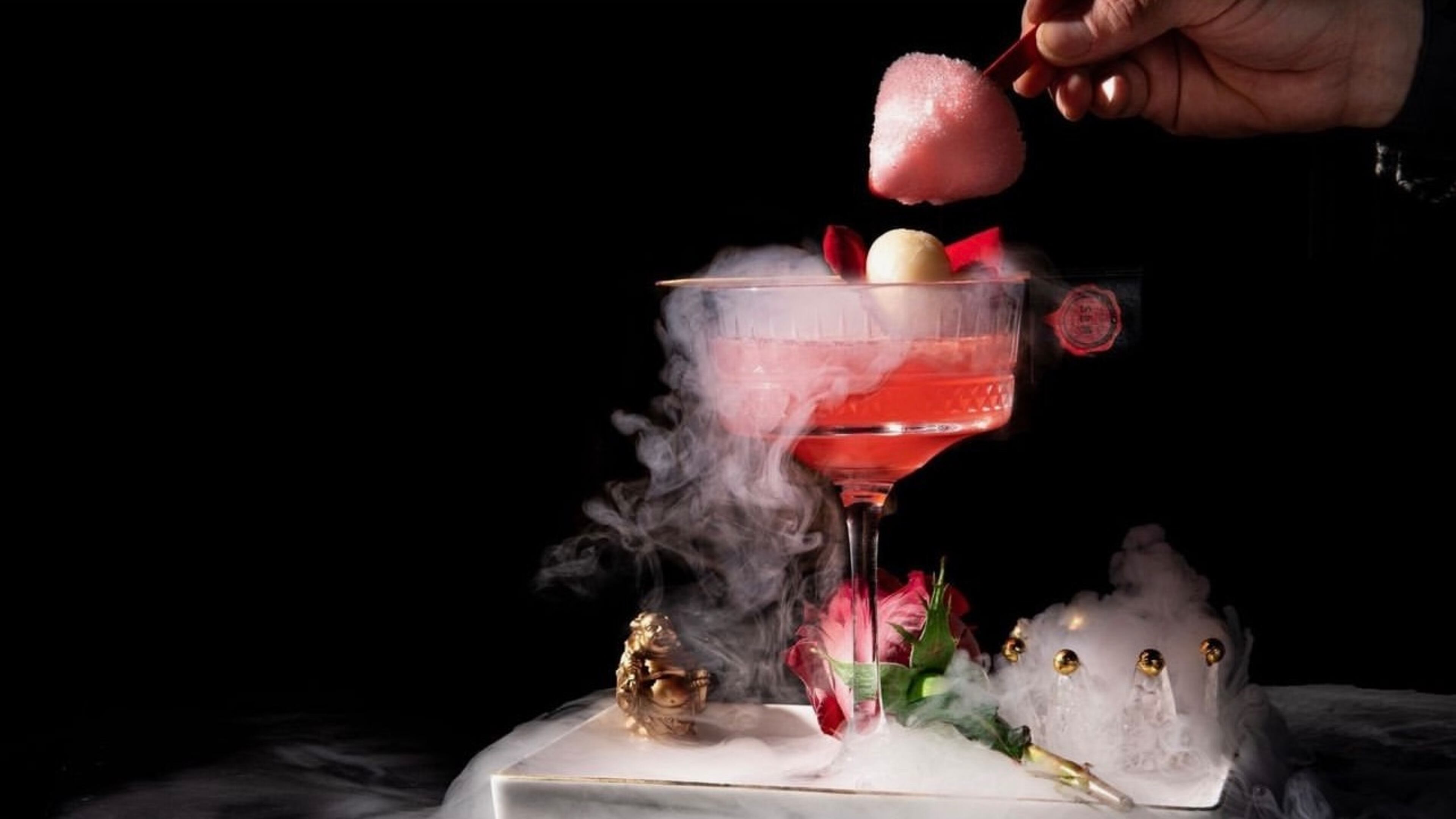 Steak Market Atlanta's lychee rose martini is both a delicious cocktail and performance art. Courtesy of Steak Market Atlanta