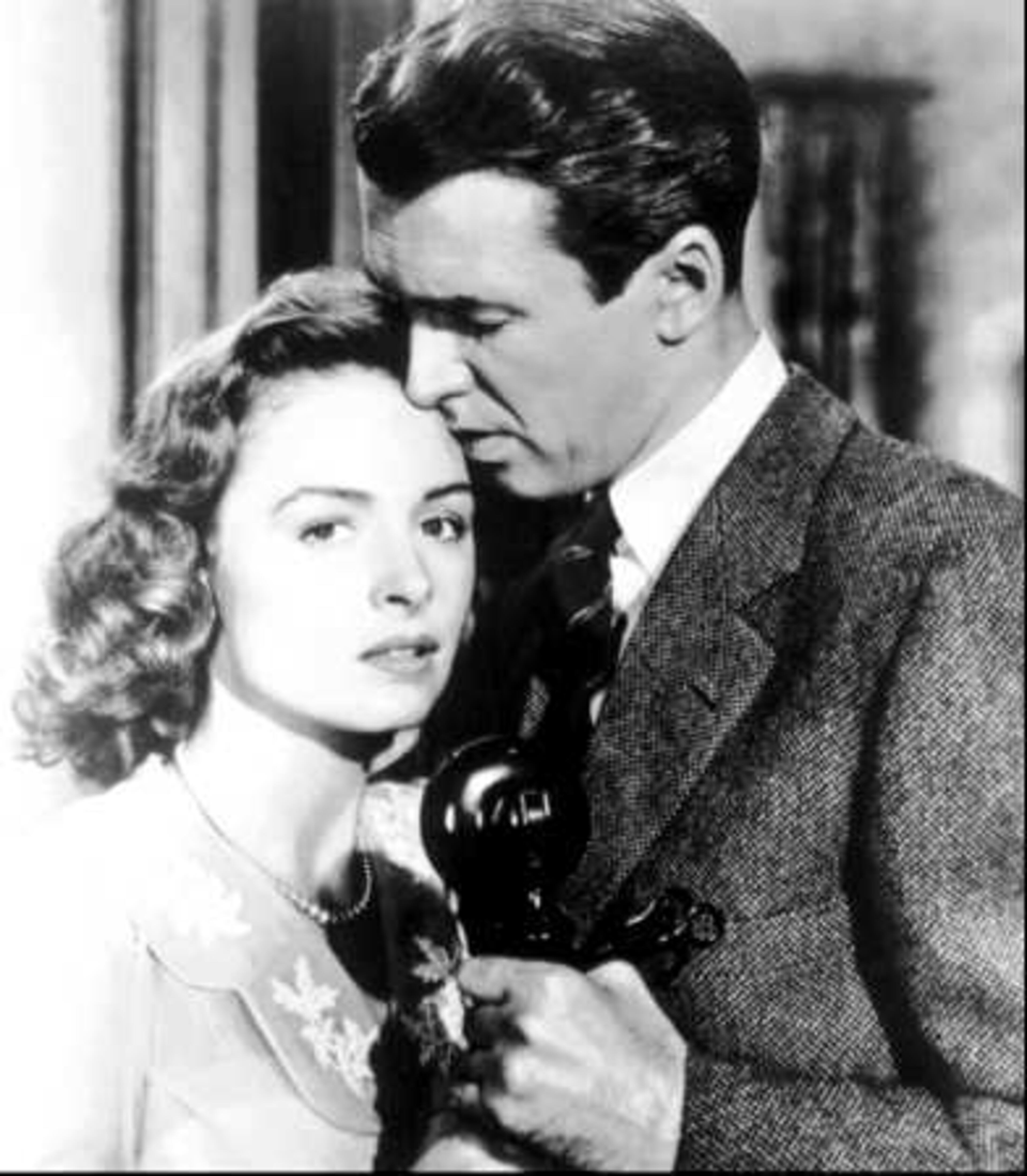 We've all been there. That moment where you desperately want to lock lips with someone but fight the urge to do so. And then you lose the battle. George (James Stewart) goes through the same thing as he and Mary (Donna Reed) squeeze in to listen to a phone call in 'It's a Wonderful Life.' When he can no longer take it, he drops the phone, yells at her and then, as she begins to cry, succumbs to temptation and passionately kisses her all over her face.