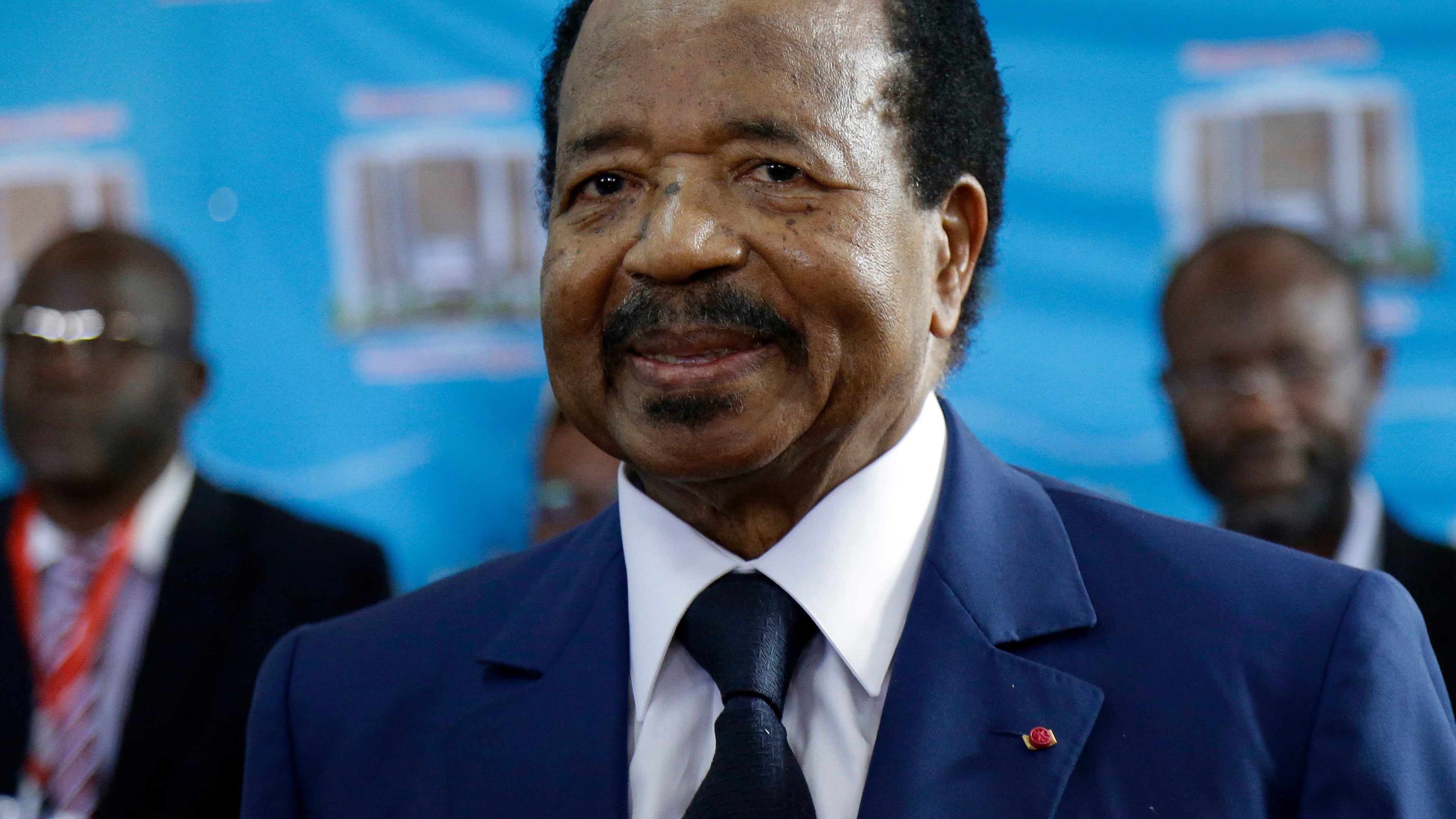 FILE - Cameroon's President Paul Biya, of the Cameroon People's Democratic Movement party, waits to cast his vote during the presidential elections, Oct. 7, 2018, in Yaounde, Cameroon. (AP Photo/Sunday Alamba, File)