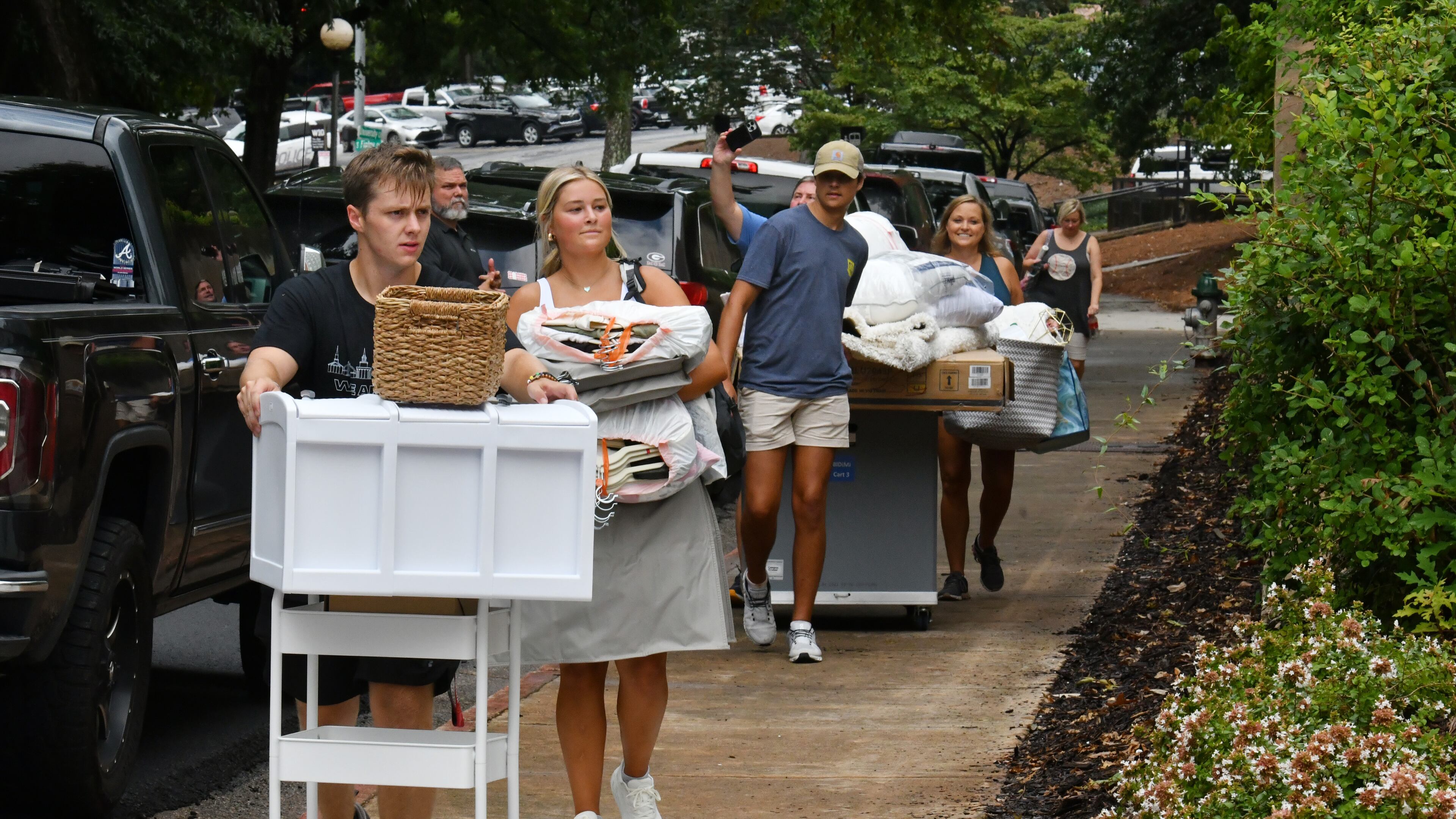 University of Georgia students move into campus housing in August. The school is planning to build a new residence hall for first-year students. (Hyosub Shin /AJC FILE PHOTO)