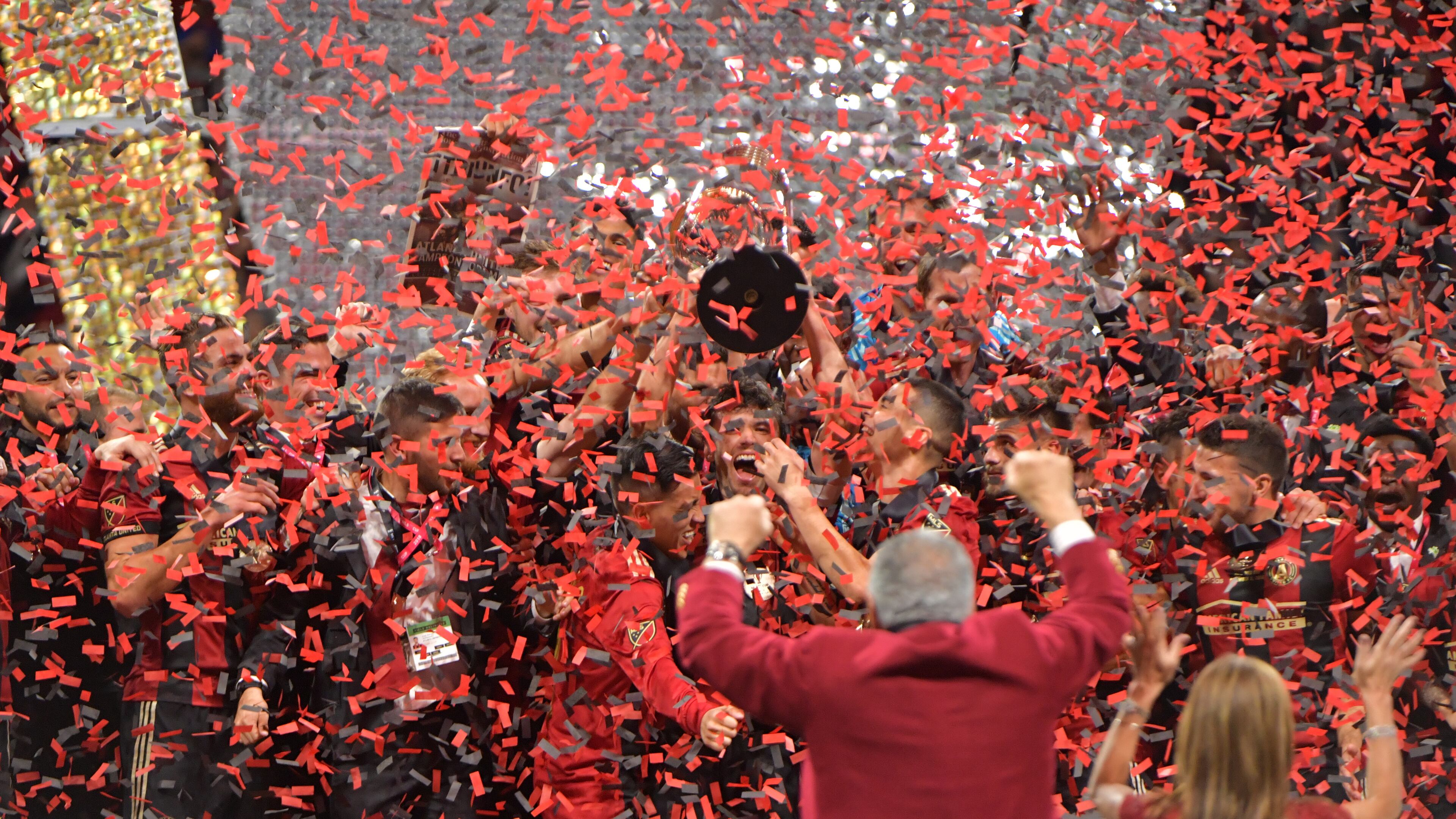 Atlanta United celebrates after their 2-0 win over the Portland Timbers during the 2018 MLS Cup at Mercedes-Benz Stadium on Saturday, December 8, 2018. HYOSUB SHIN / HSHIN@AJC.COM