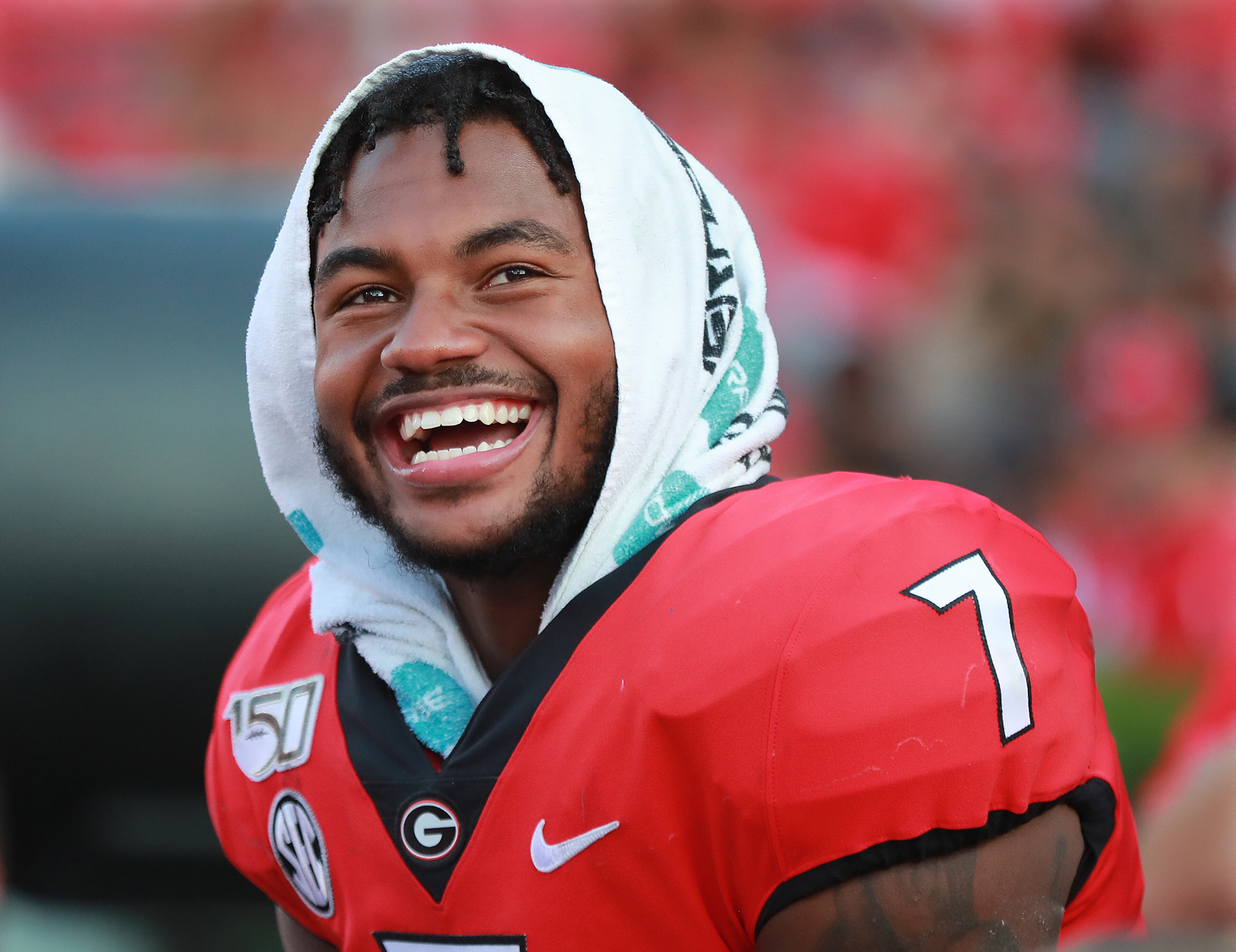 Georgia tailback D'Andre Swift is all smiles on the sidelines during the fourth quarter. Curtis Compton/ccompton@ajc.com