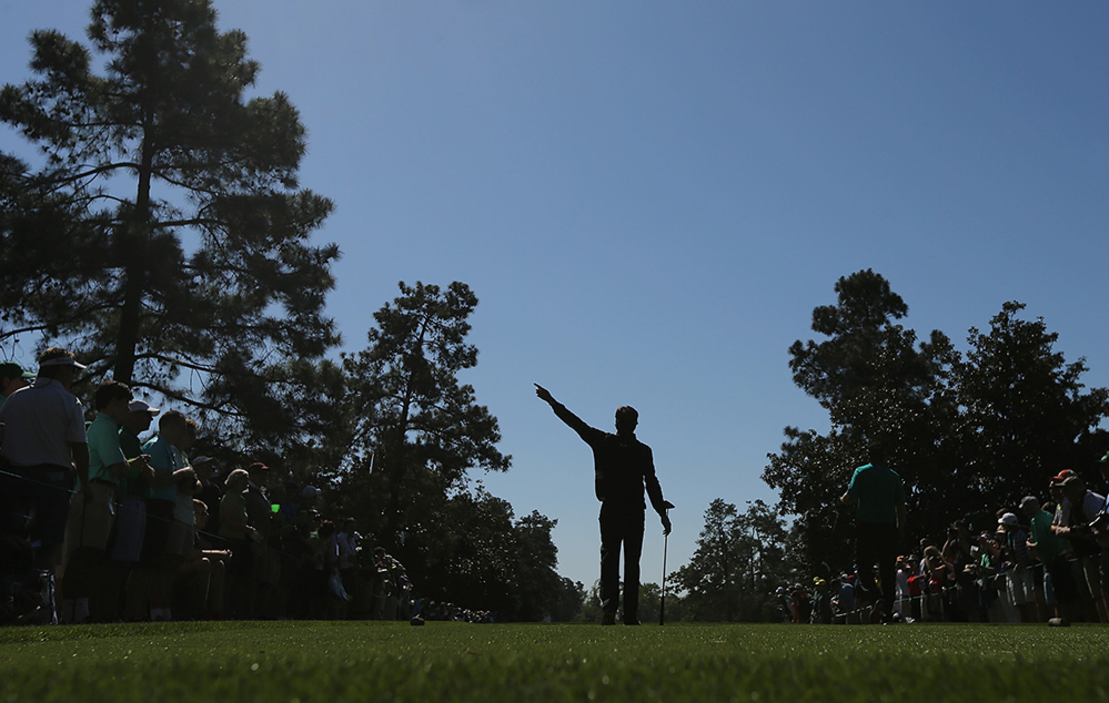 Two-time Masters champion Bubba Watson hooks his drive into the woods off the 9th tee during his practice round at Augusta National Golf Club on Tuesday, April 5, 2016, in Augusta.
