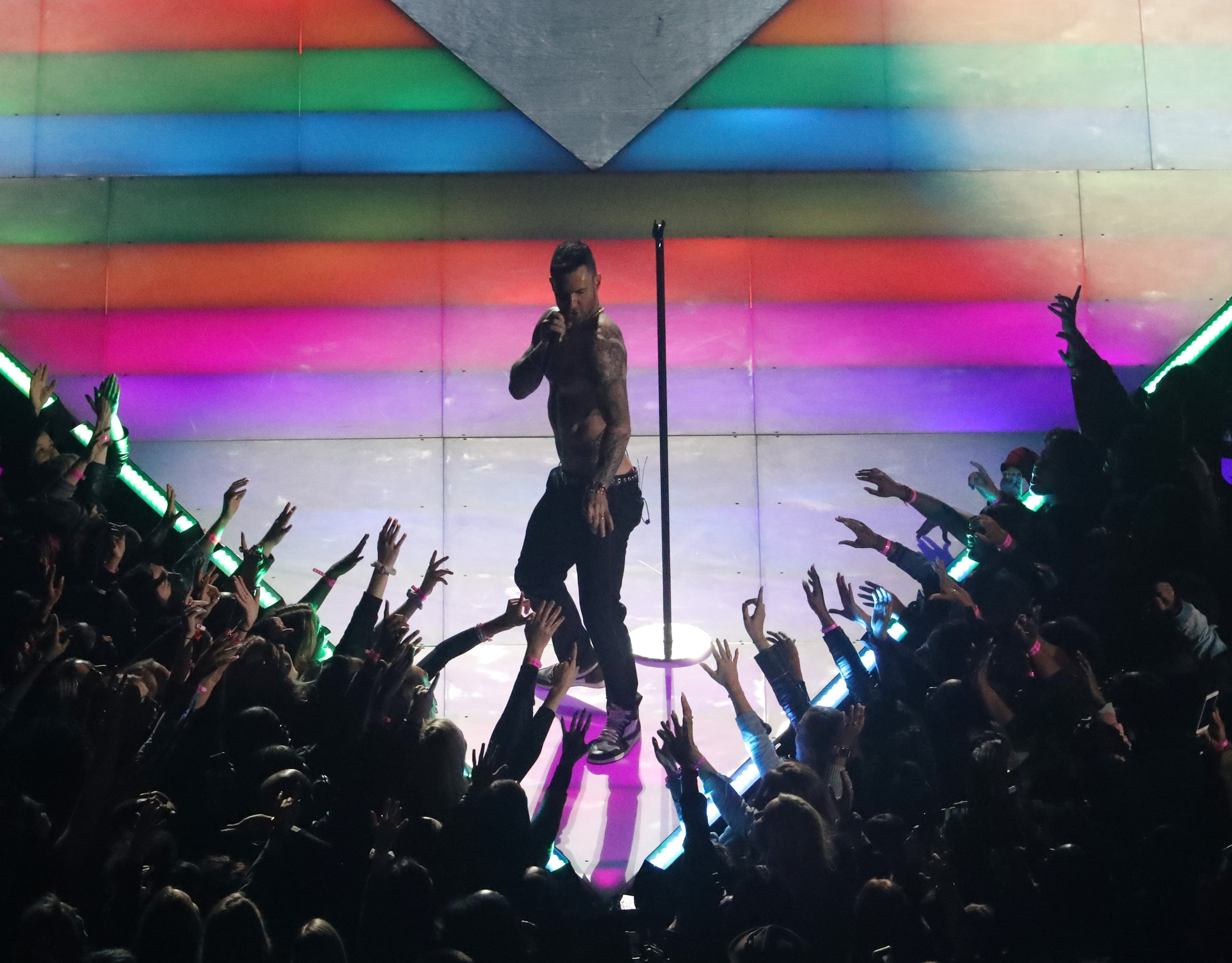2/3/19 - Atlanta - Maroon 5's Adam Levine goes shirtless during the Super Bowl Halftime Show on Sunday, Feb. 3, 2019. The New England Patriots played the Los Angeles Rams in Super Bowl LIII at Mercedes-Benz Stadium in Atlanta, Ga. (ALYSSA POINTER/ALYSSA.POINTER@AJC.COM)
