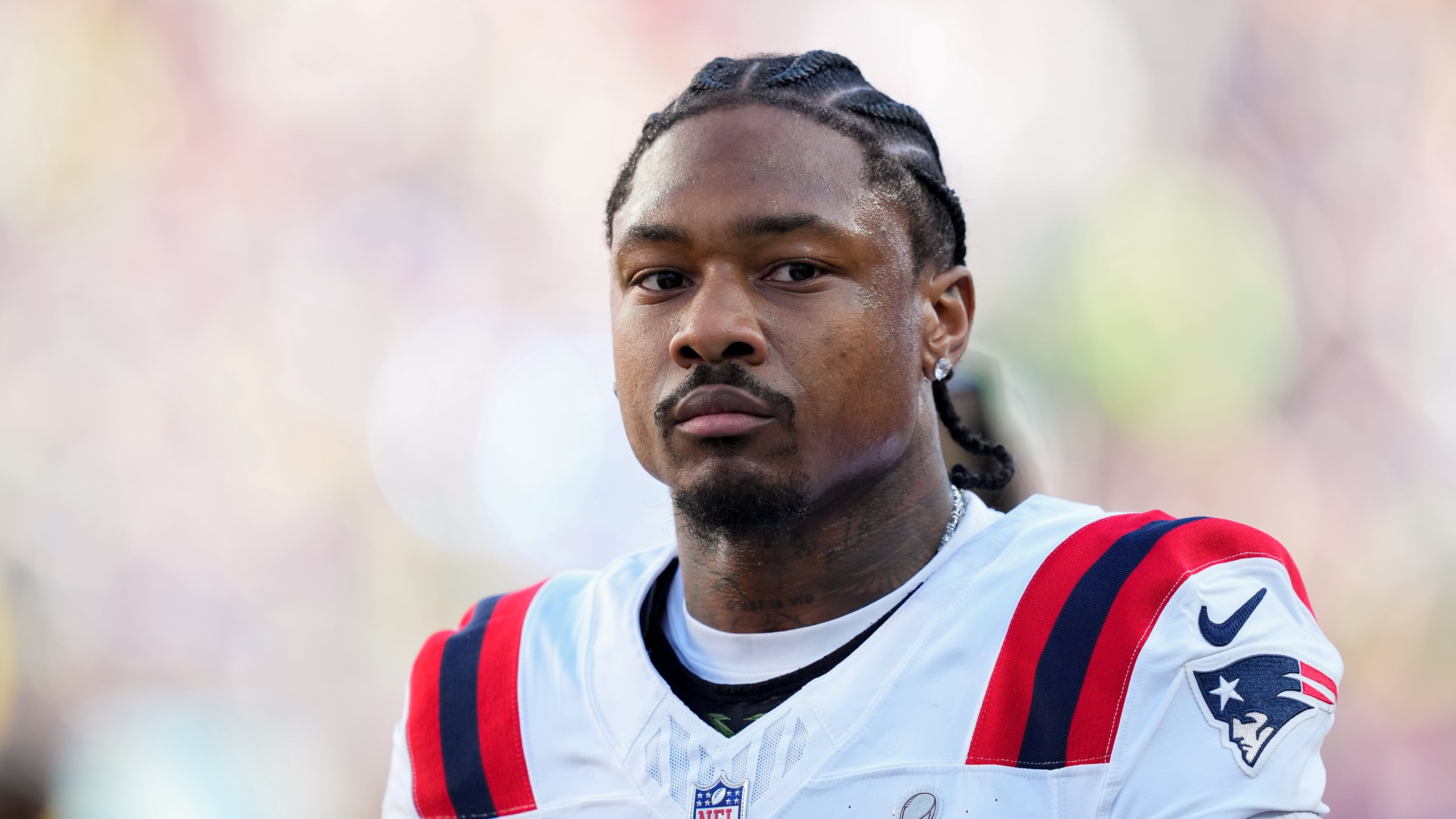 FILE - New England Patriots wide receiver Stefon Diggs walks off the field before the NFL Super Bowl 60 football game against the Seattle Seahawks, Feb. 8, 2026, in Santa Clara, Calif. (AP Photo/Julio Cortez, File)