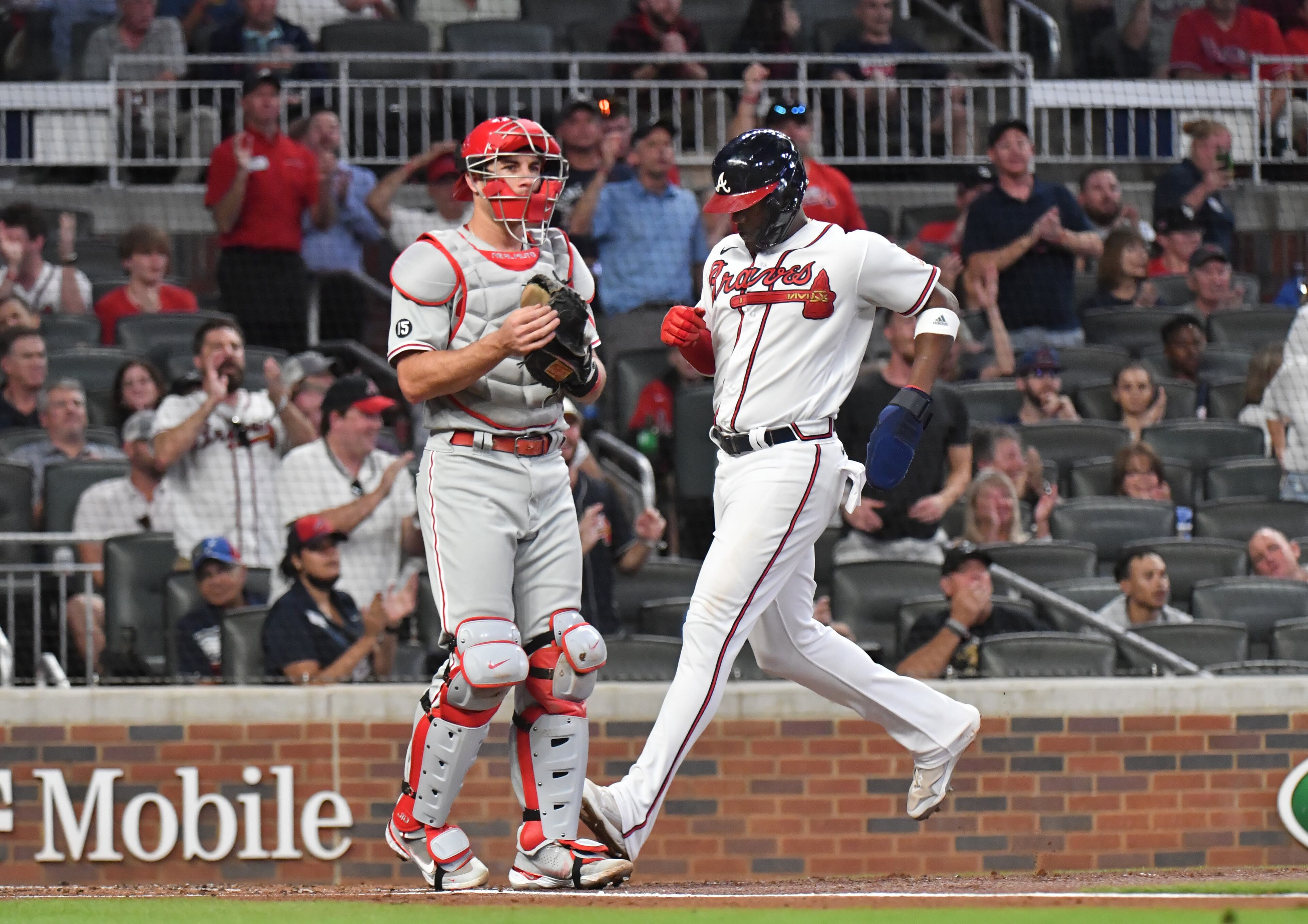 September 29, 2021 Atlanta - Atlanta Braves right fielder Jorge Soler (12) scores on an RBI single by Atlanta Braves third baseman Austin Riley (27) in the first inning at Truist Park on Wednesday, September 29, 2021. (Hyosub Shin / Hyosub.Shin@ajc.com)