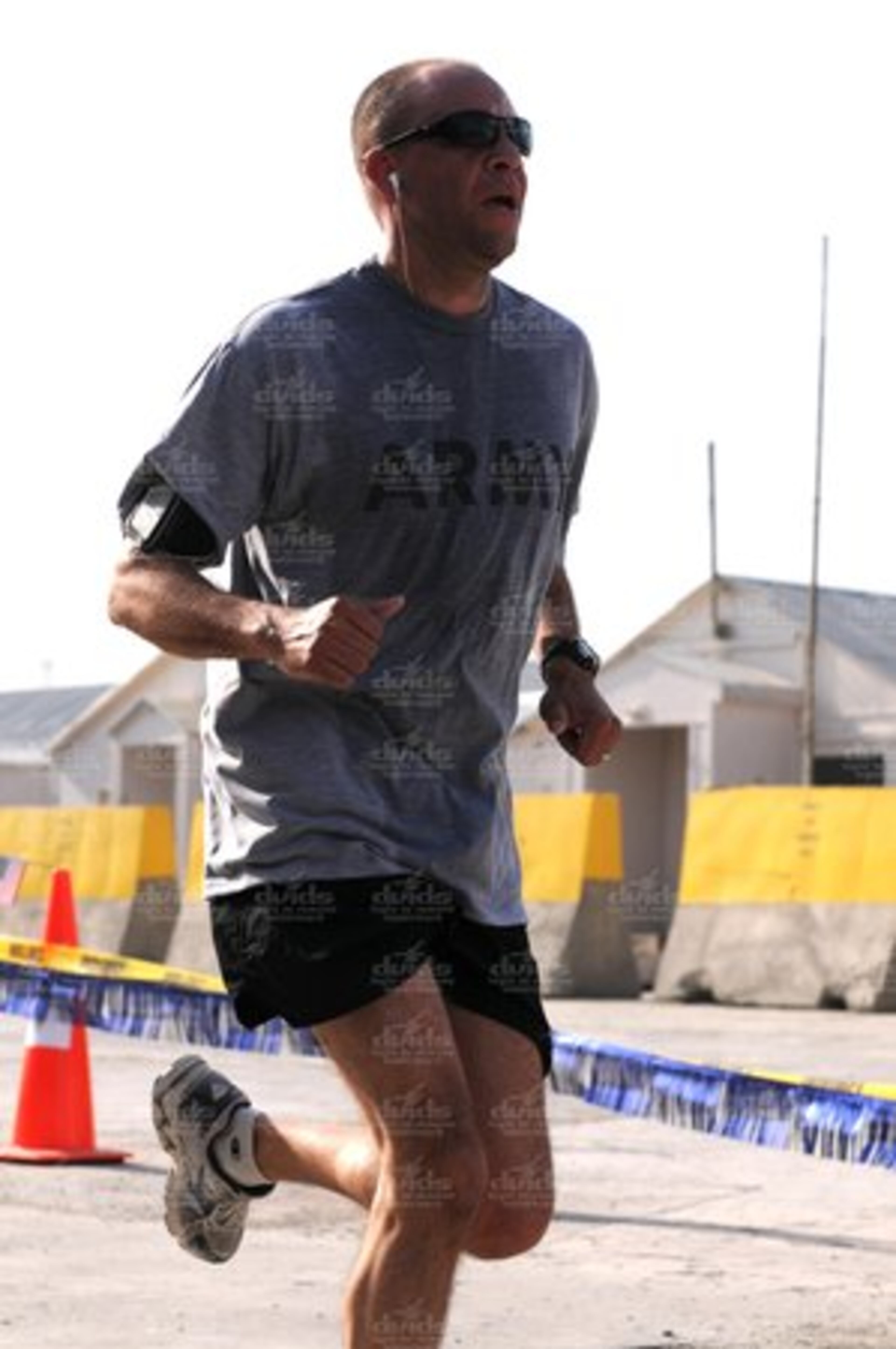 In Afghanistan, Lt. Col. Andrew Gerlach, Task Force Rushmore, 196th Maneuver Enhancement Brigade, South Dakota Army National Guard, completes the Peachtree Road Race on July 4.