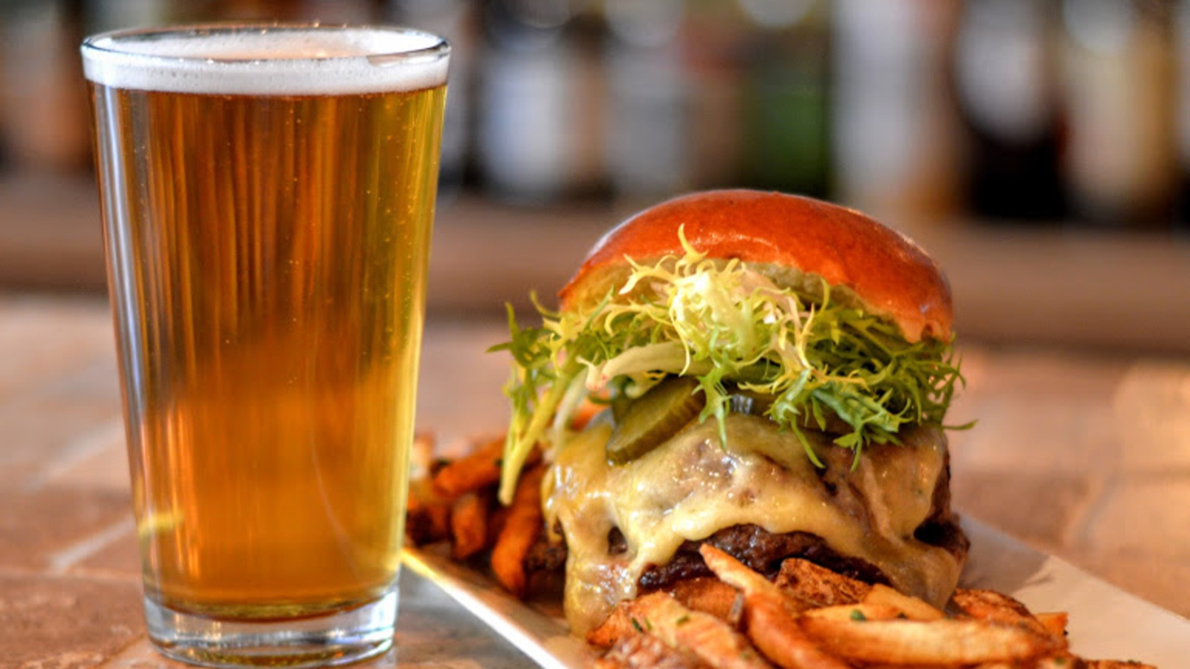 Grab a burger and beer for $14 tonight at Vine & Tap. Photo credit: Henri Hollins.