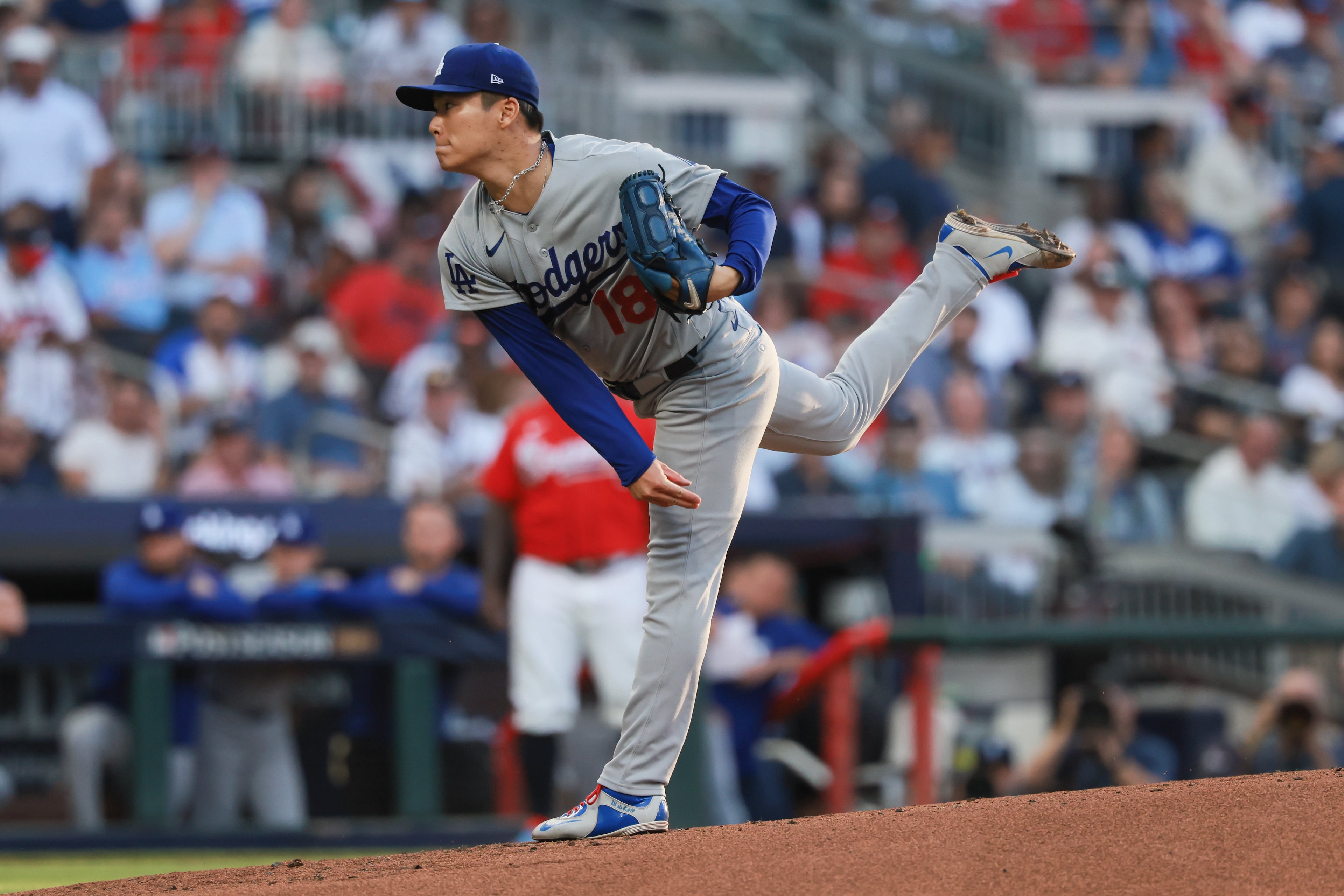 Los Angeles Dodgers pitcher Yoshinobu Yamamoto (18) delivers to an Atlanta Braves batter during the first inning of Game 3 of the MLB National League Division Series between the Atlanta Braves and the Los Angeles Dodgers, Tuesday, Oct. 6, 2026, in Atlanta. (Jason Getz/AJC)