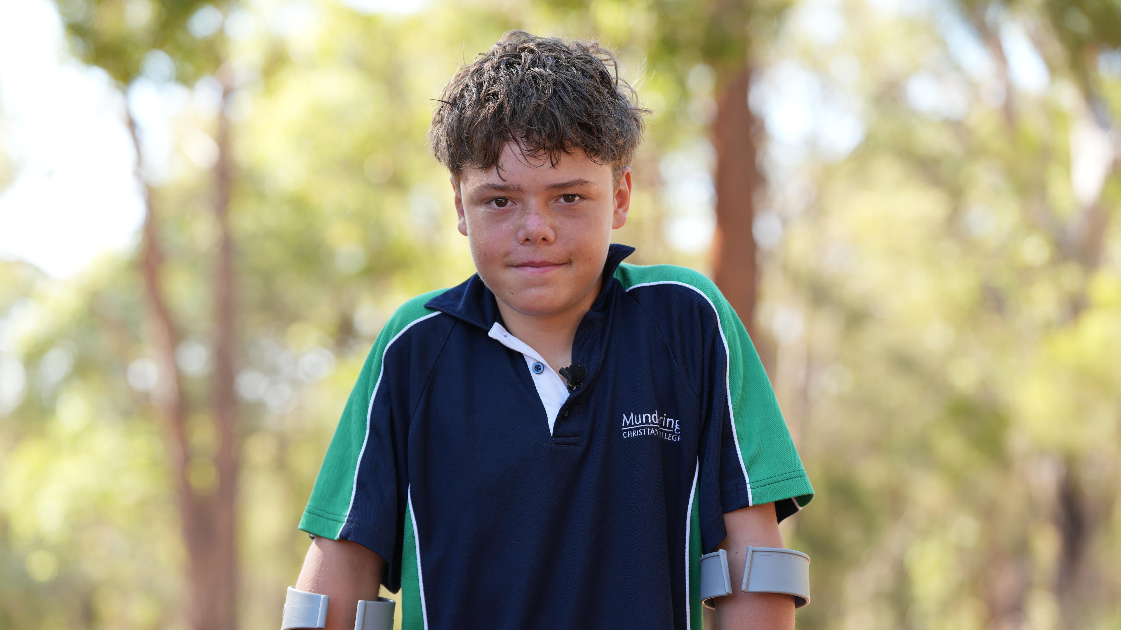 Austin Appelbee poses for a photo in Gidgegannup, Australia, Tuesday Feb. 3, 2026, after the 13-year-old made an hourslong swim to raise an alarm after his family was swept out to sea off the Australian coast. (Briana Shepherd/ABC via AP)