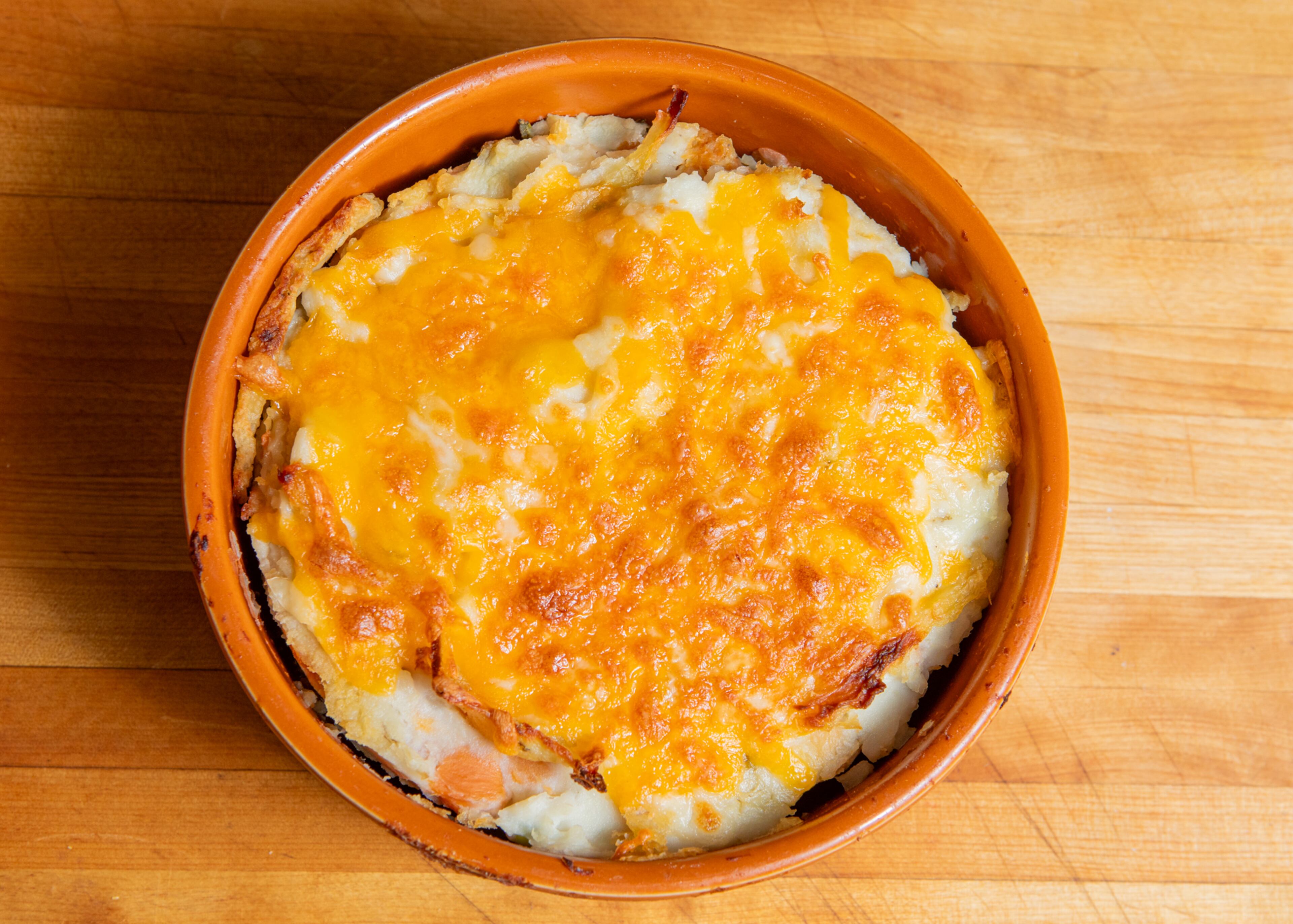 Mix leftover turkey and stuffing with eggs, cream and fresh herbs to make a delicious brunch strata. (Aaliyah Man for The Atlanta Journal-Constitution)