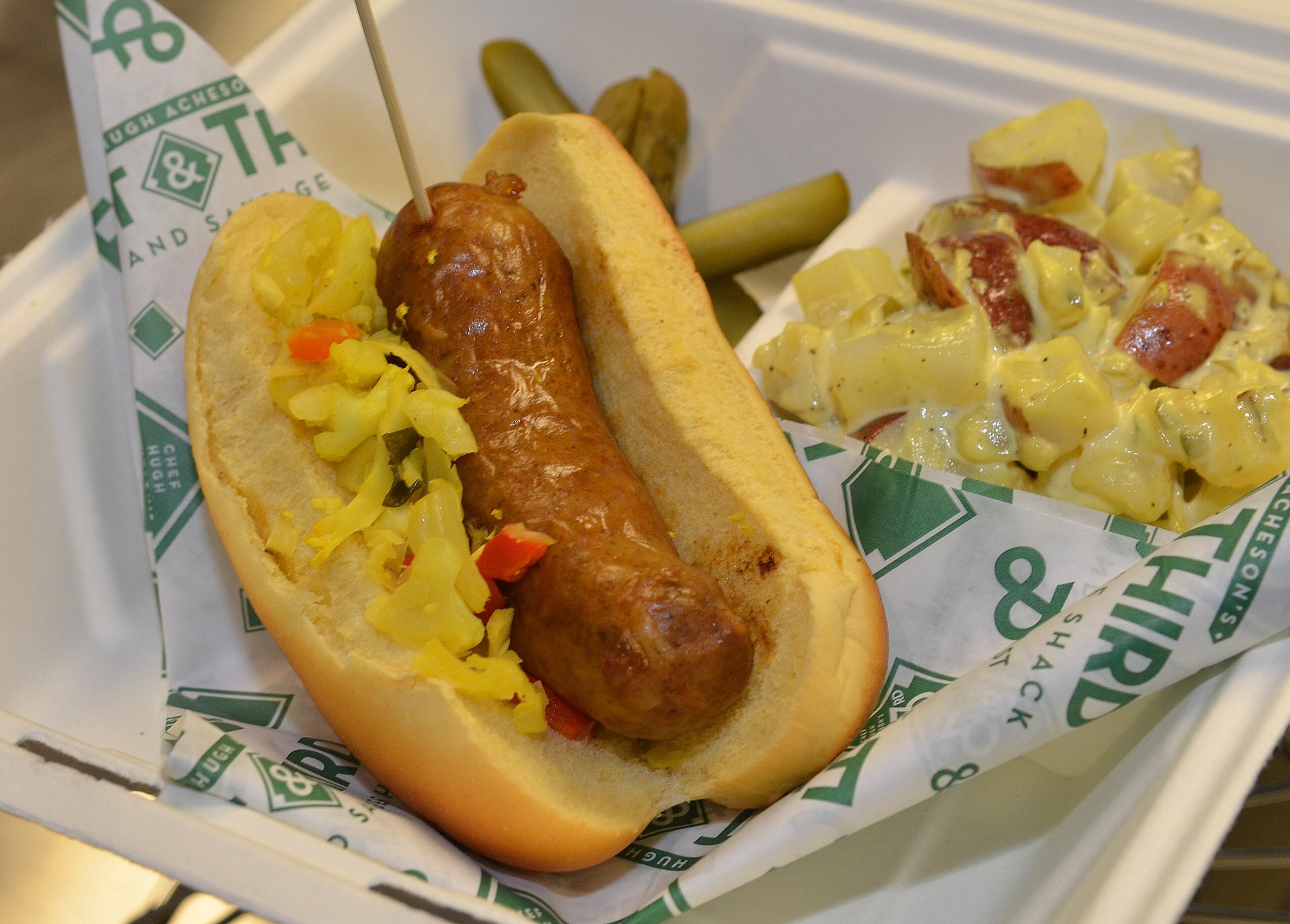 170323 Atlanta, Ga (Suntrust Park): The Andouille sausage dog from First and Third at Suntrust Park concessions. The Atlanta Braves and Delaware North Sportservice, the hospitality and food service provider for the Atlanta Braves, host a tasting tour of the soon to be opened Suntrust Park to reveal the food and beverage options available for the 2017 season. All photos taken Thursday March 23, 2017 at Suntrust Park 755 Battery Avenue, Smyrna, Ga 30339. (Chris Hunt/Special) for story slugged 041417Bravesdishes