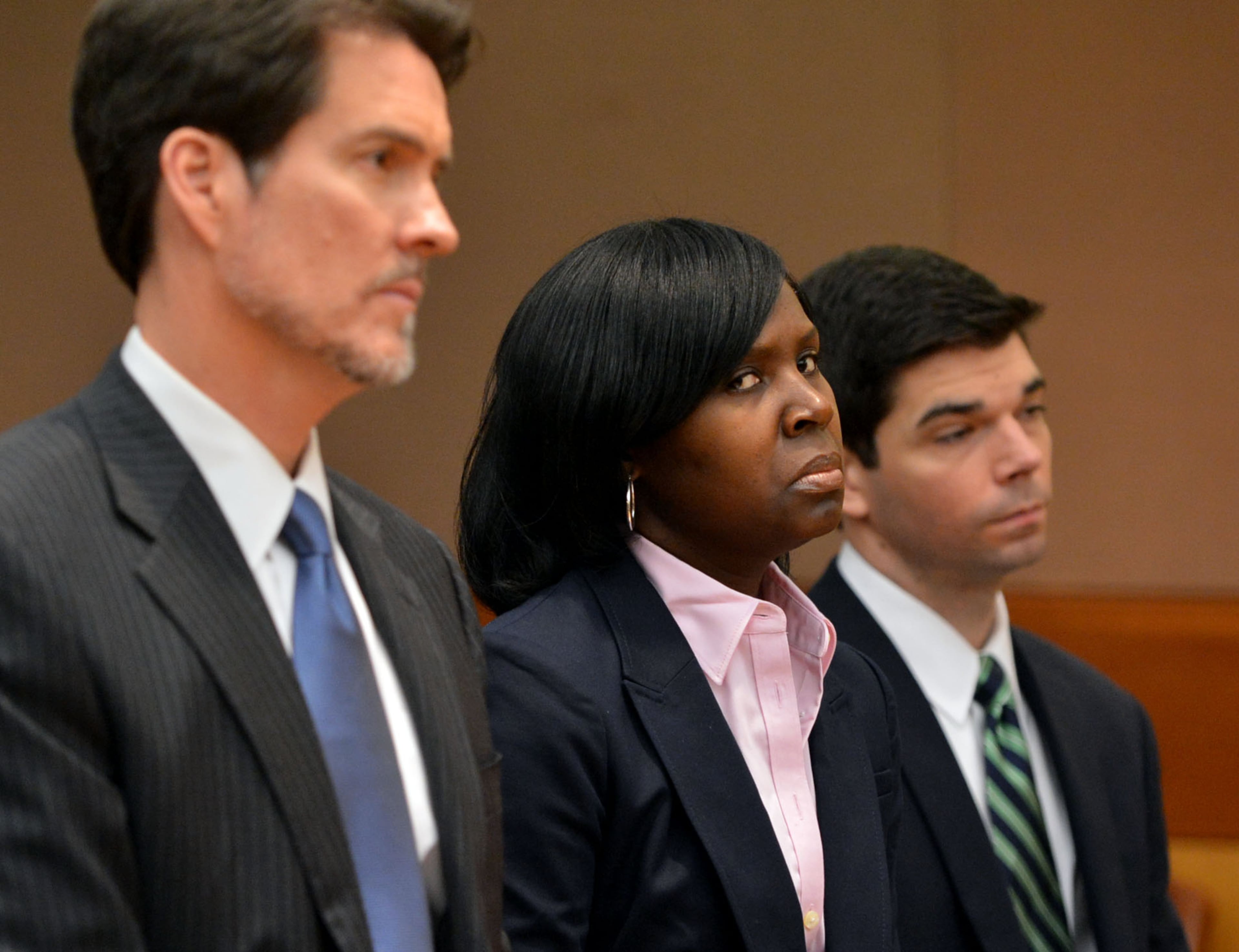 Sandra Ward, sits with her attorney Page Pate during the hearing. Ward. a former administrator at Parks Middle School, pleaded guilty to a reduced charge. She was sentenced to serve one year probation, repay $5,000 she received in bonus money, perform 250 hours of community service and cooperate with the prosecution. Educators in the Atlanta Public Schools cheating scandal enter pleas before Judge Jerry Baxter in Fulton County Superior Court Friday, February 21, 2014. Any defendants in the widespread Atlanta Public Schools cheating case who don't make guilty pleas by the end of Friday will likely go on trial this spring, including Superintendent Beverly Hall and senior members of her staff. KENT D. JOHNSON / KDJOHNSON@AJC.COM
