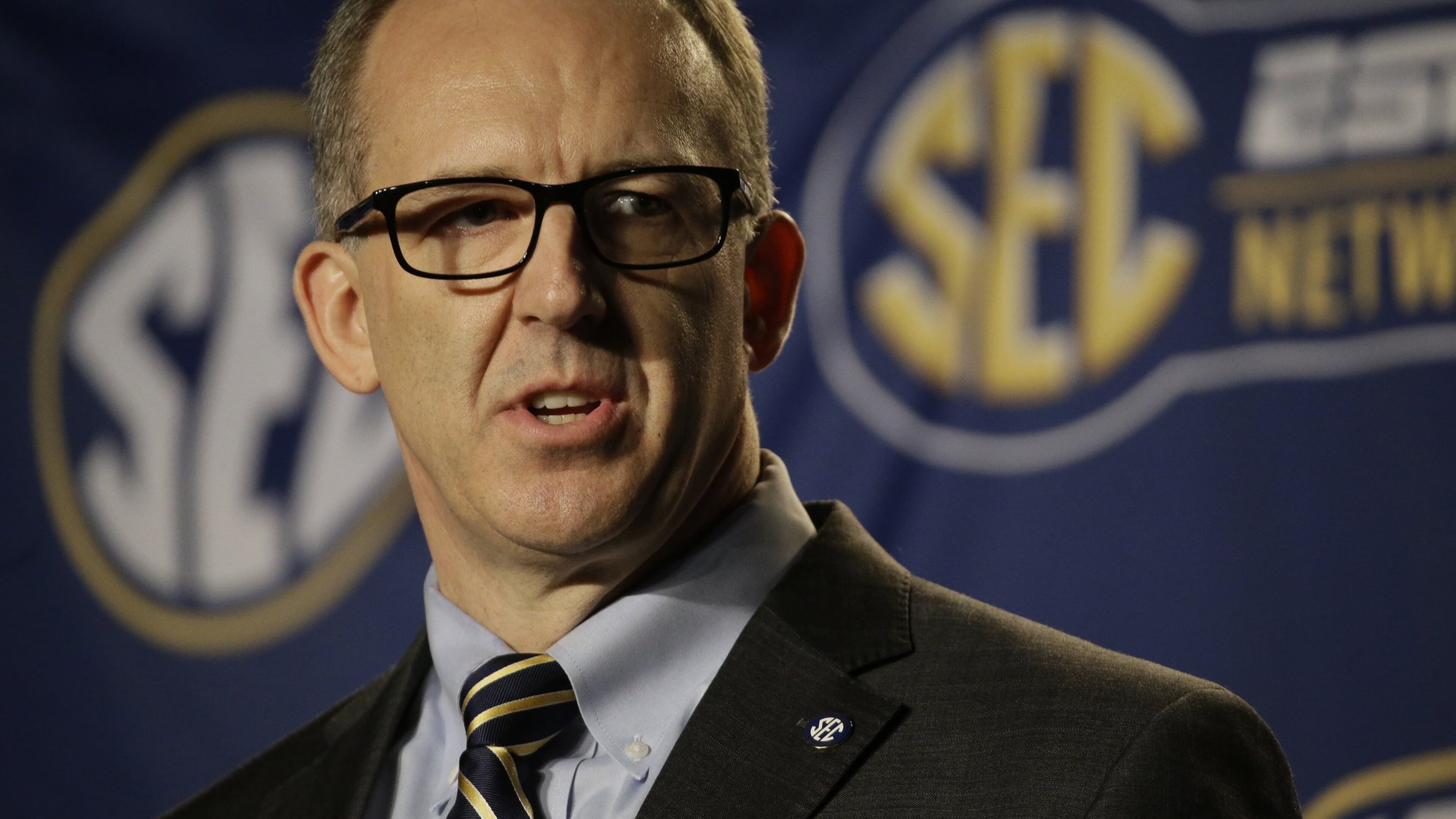 SEC commissioner Greg Sankey said: "The decision was to allow institutions to make determinations about enrolling certain individuals with behaviors.” (AP file photo)