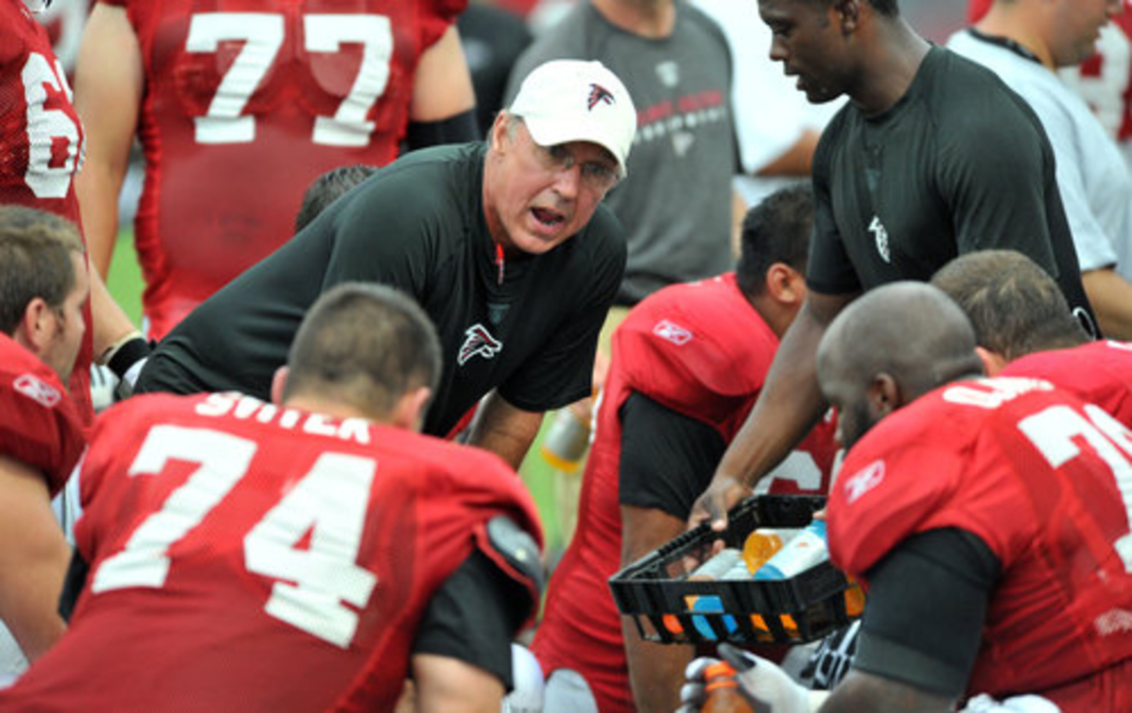 Atlanta Falcons coach Paul Boudreau instructs during halftime during the Friday Night Lights at North Gwinnett High School in Suwanee.