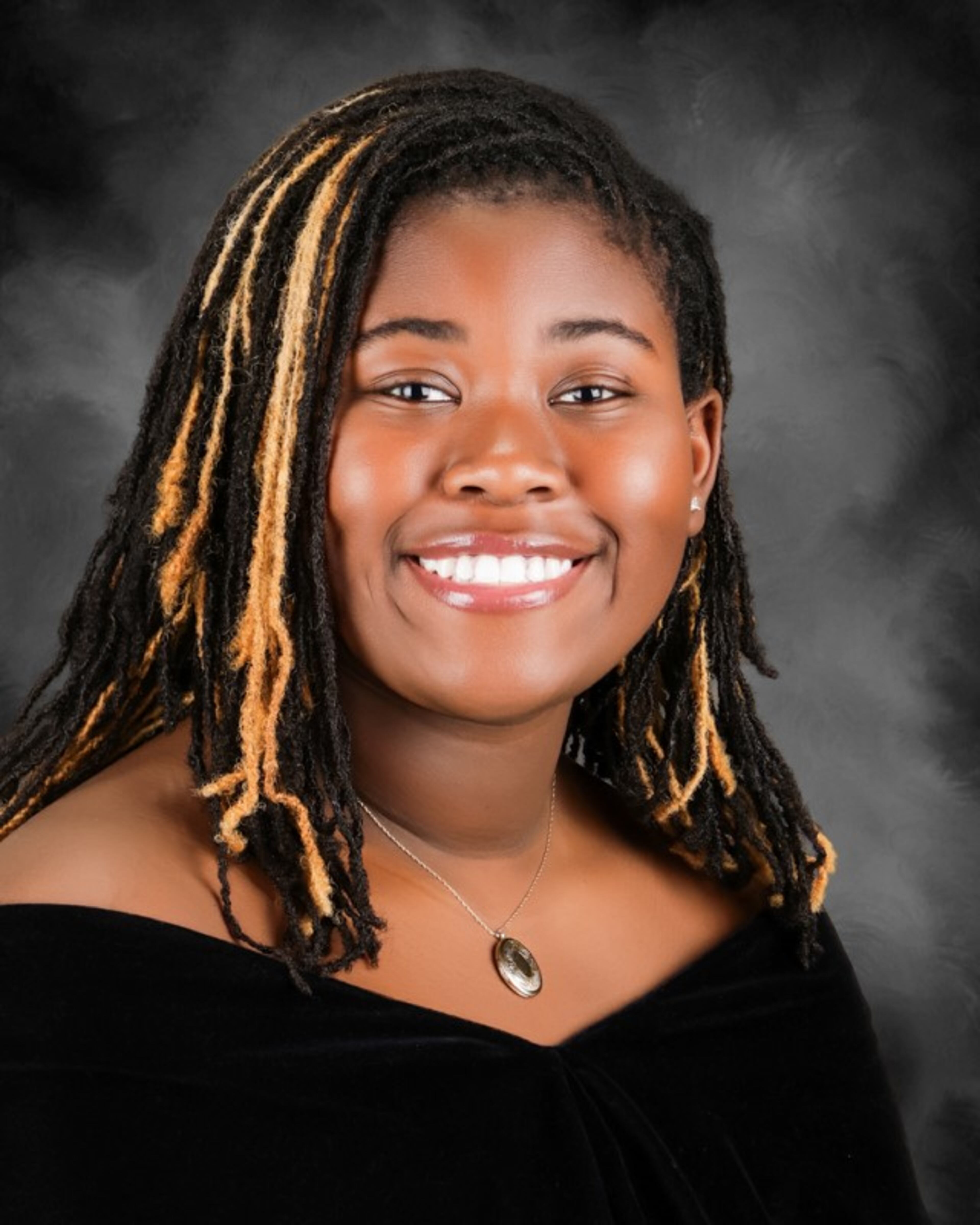 Makayla Youmans is the 2025 valedictorian of Global Impact Academy in Fulton County. Youmans plans to study chemistry at Kennesaw State University. "Our class is very on-the-cusp for both digital ages. I feel our age group was one of the last who got to experience cable TV but still grew up with tablets and cell phones." (Handout)