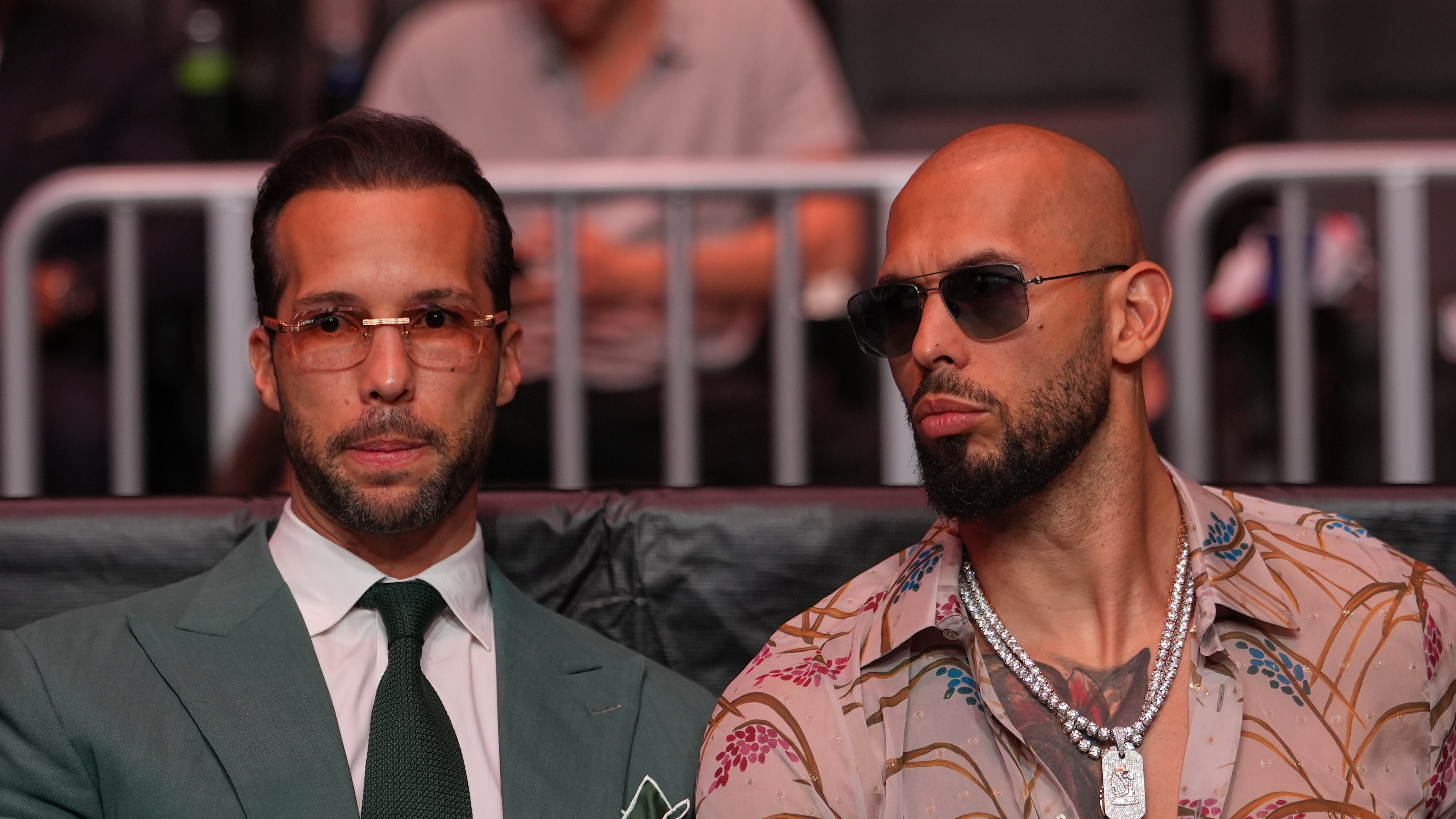 FILE - Andrew Tate, right, and his brother, Tristan, arrive at an event, April 11, 2026, in Miami. (AP Photo/Julia Demaree Nikhinson, Pool, File)