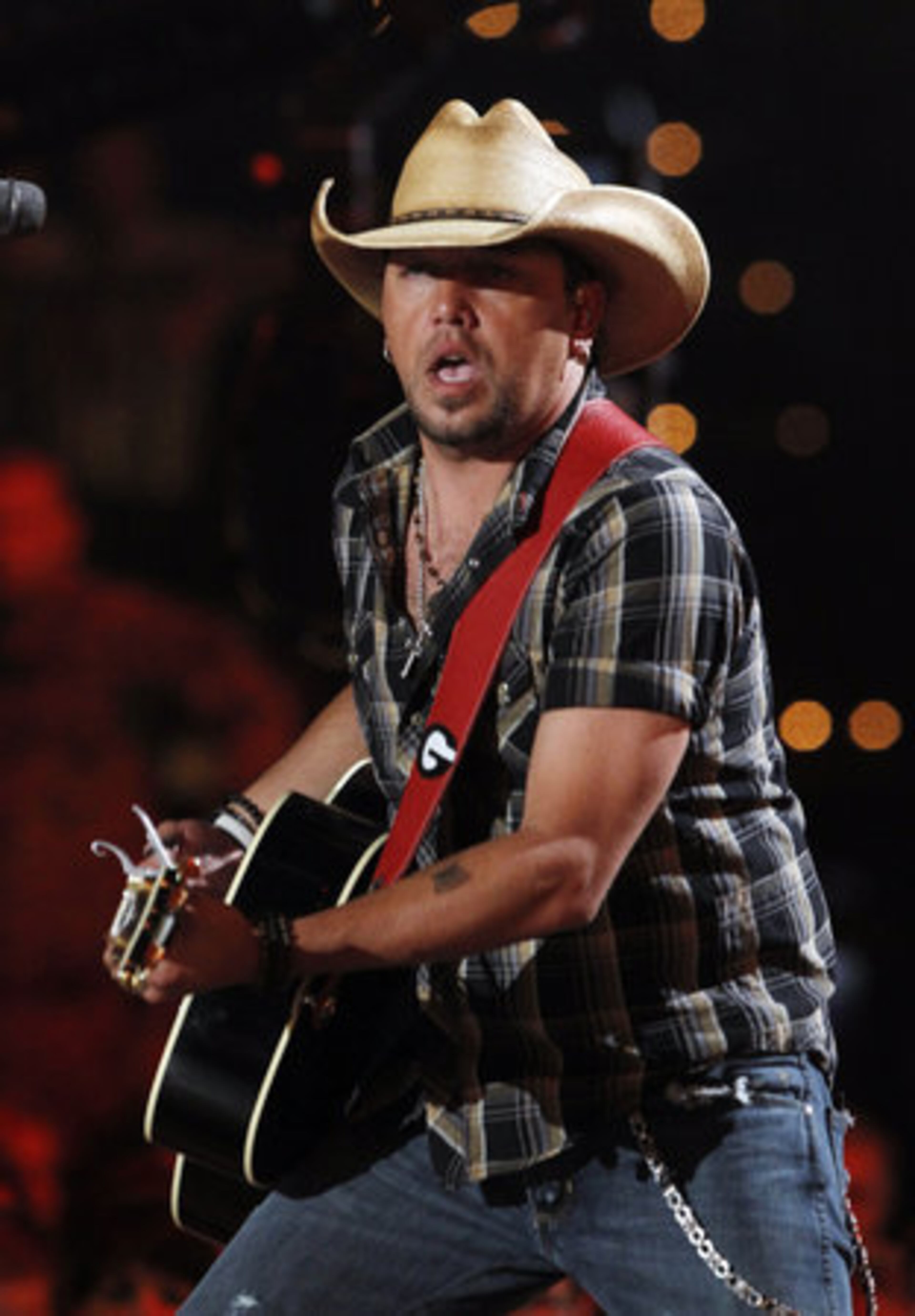 Jason Aldean performs "Dirt Road Anthem." Rapper Ludacris joined him on stage.