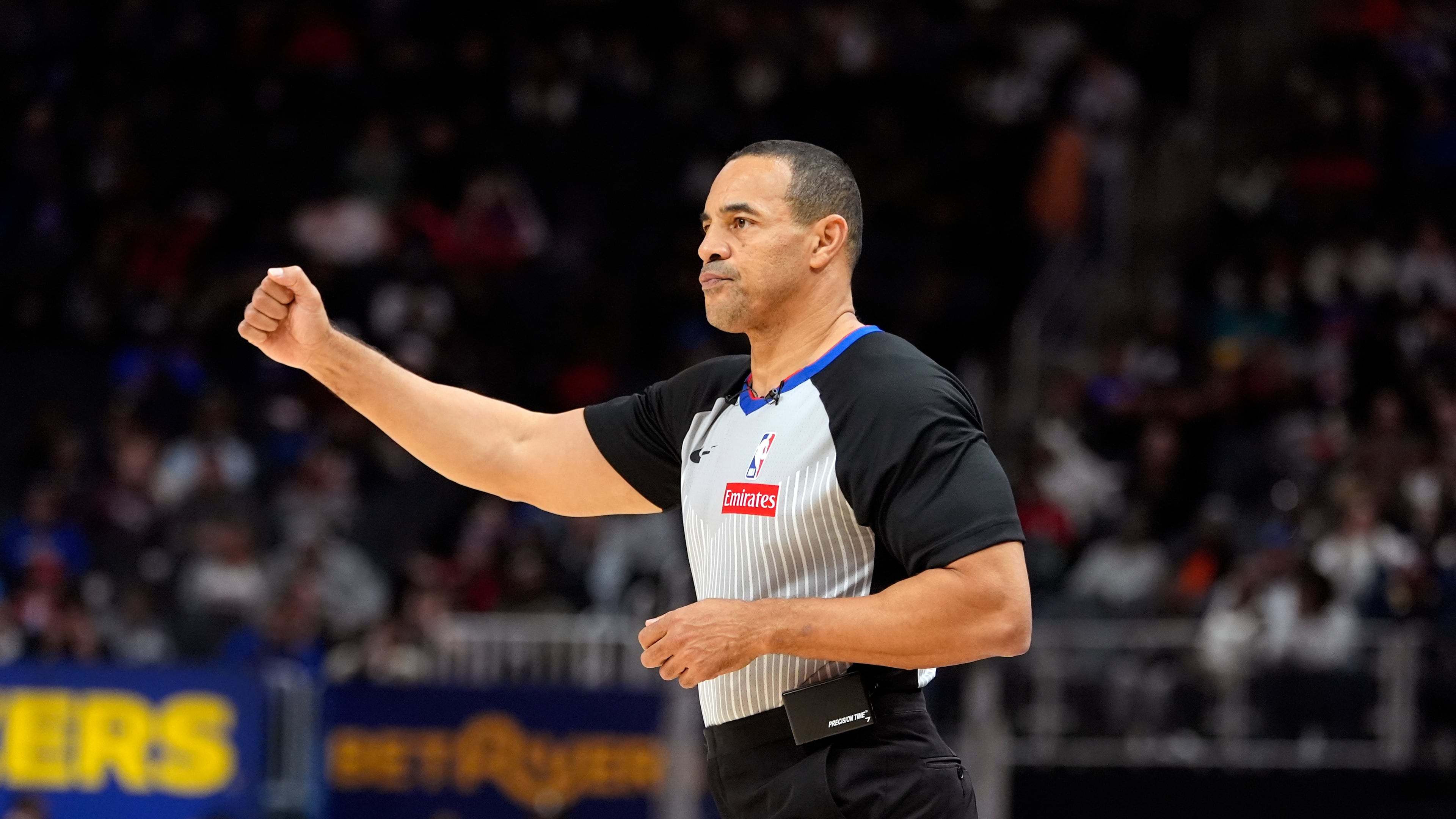 FILE - Referee Curtis Blair signals during the second half of an NBA basketball game between the Detroit Pistons and the Chicago Bulls, Nov. 18, 2024, in Detroit. (AP Photo/Carlos Osorio, File)