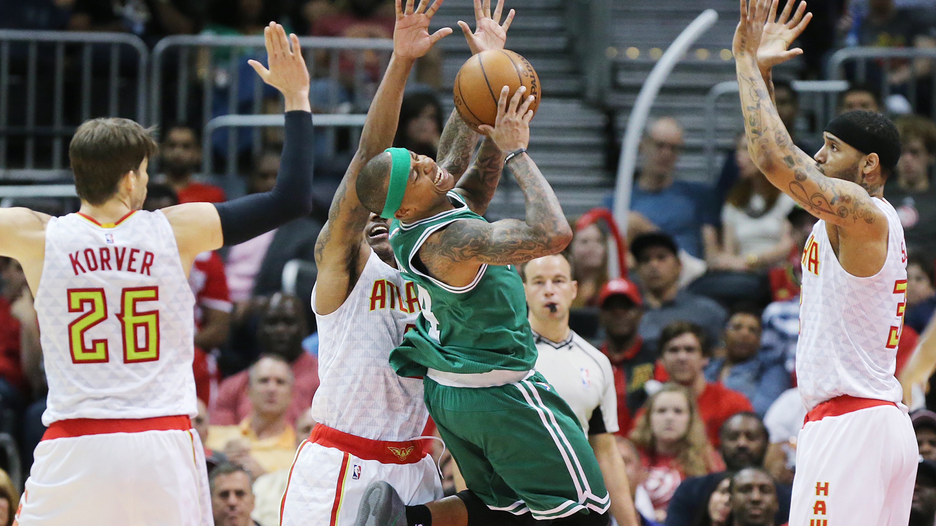 041916 ATLANTA: Hawks Kyle Korver (from left), jeff Teague, and Mike Scott triple team Celtics Isaiah Thomas stopping his drive to the basket in their NBA Eastern Conference first round playoff game at Philips Arena on Tuesday, April 19, 2016. Curtis Compton / ccompton@ajc.com